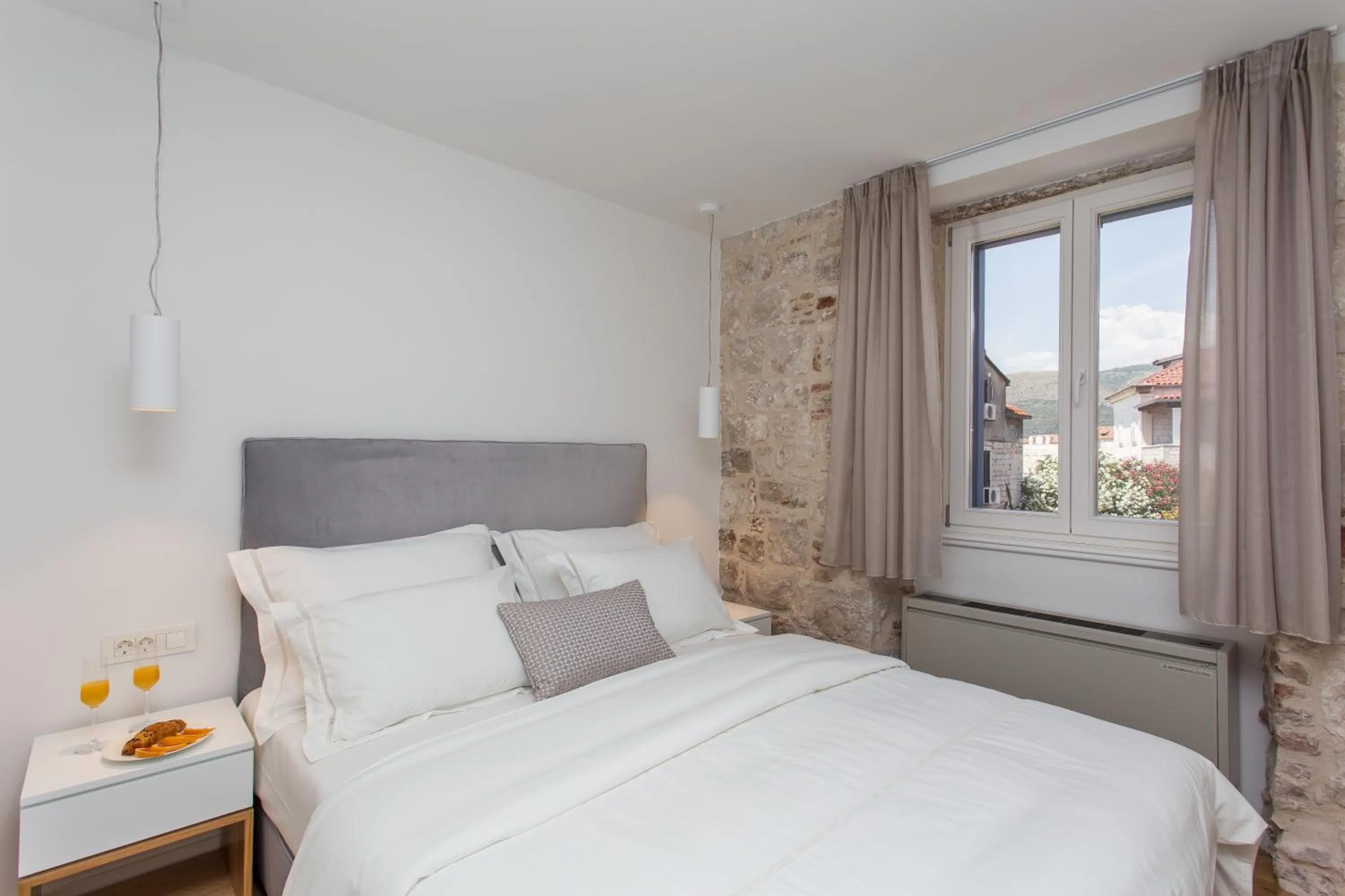 Bed in Bifora Heritage Hotel