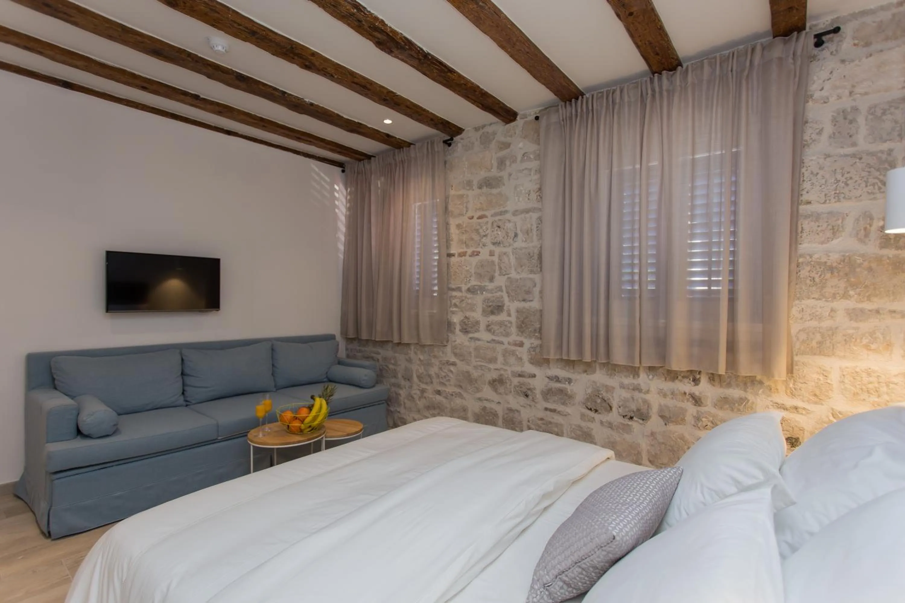 Bed in Bifora Heritage Hotel