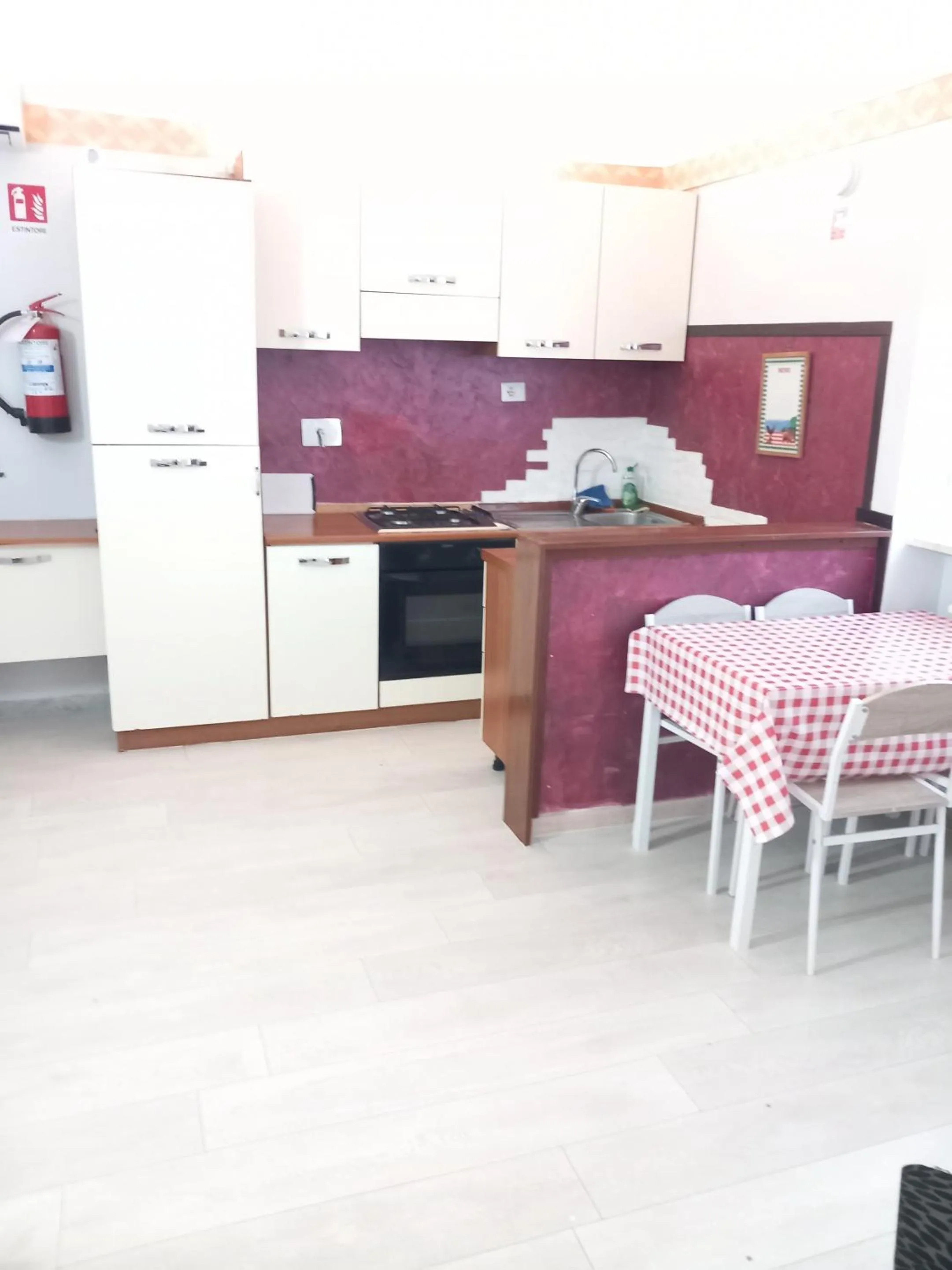 Kitchen or kitchenette in A casa tua Ostia Antica