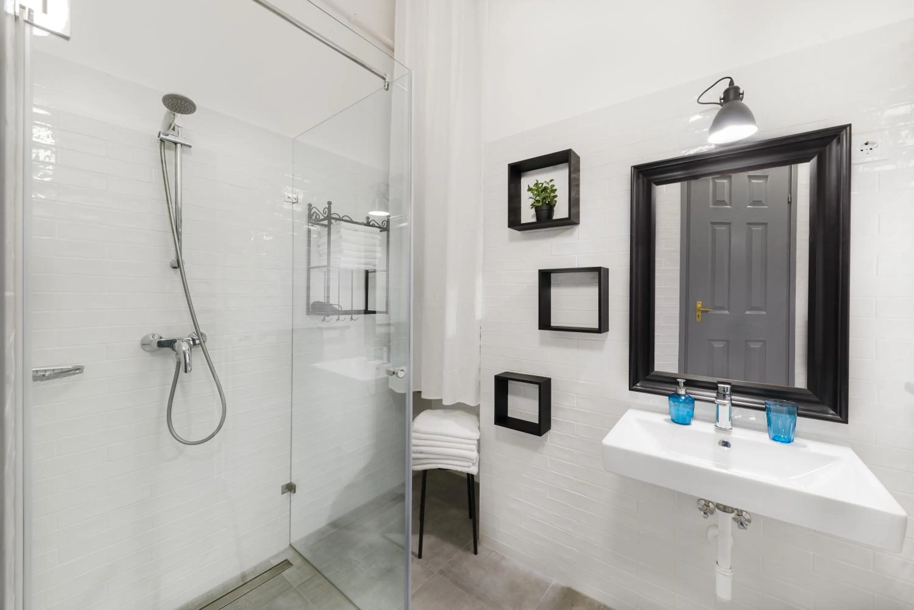 Shower in Karma Boutique Apartments