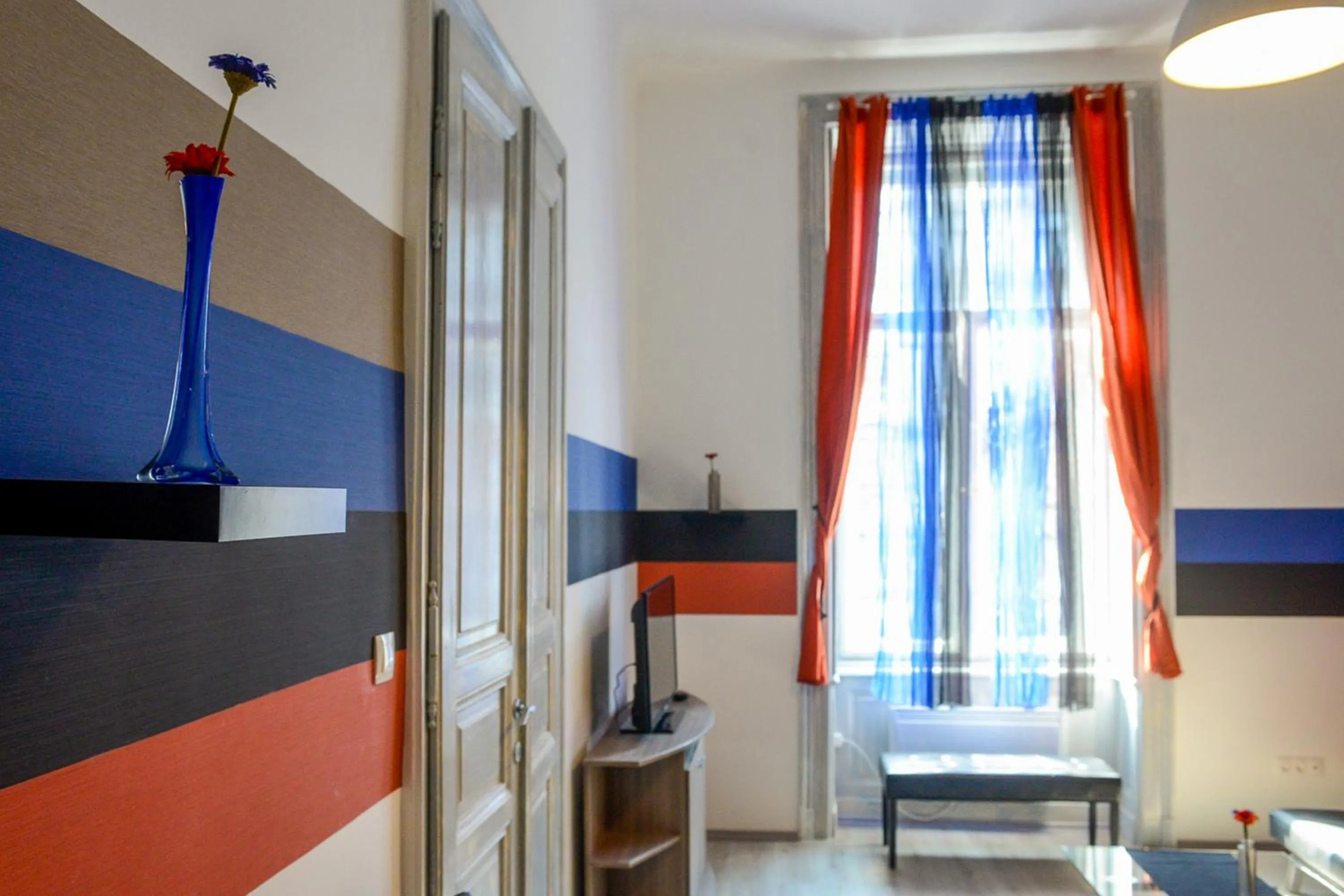 Living room, Bed in Karma Boutique Apartments