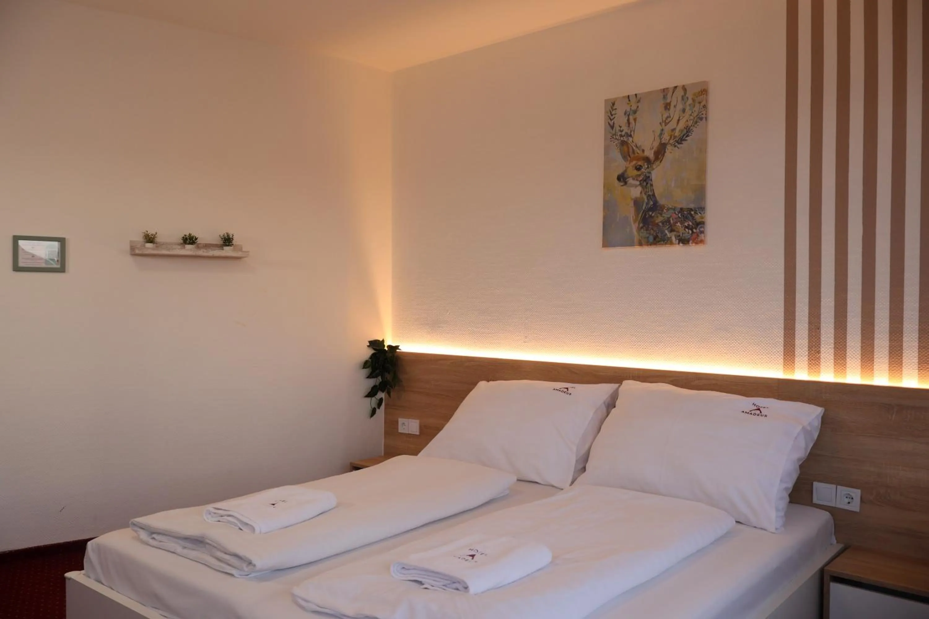 Bed in Hotel Amadeus