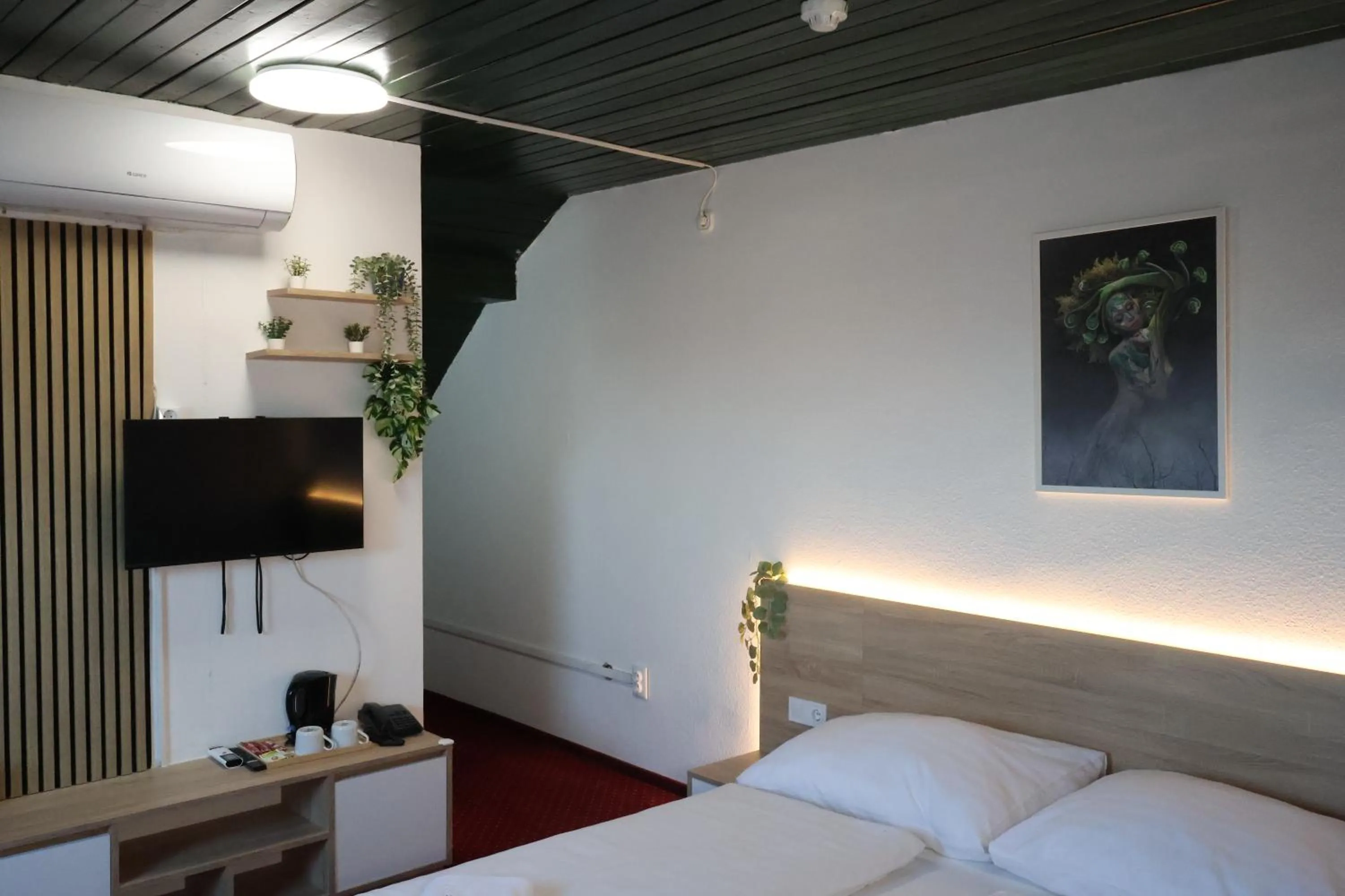 Bed in Hotel Amadeus