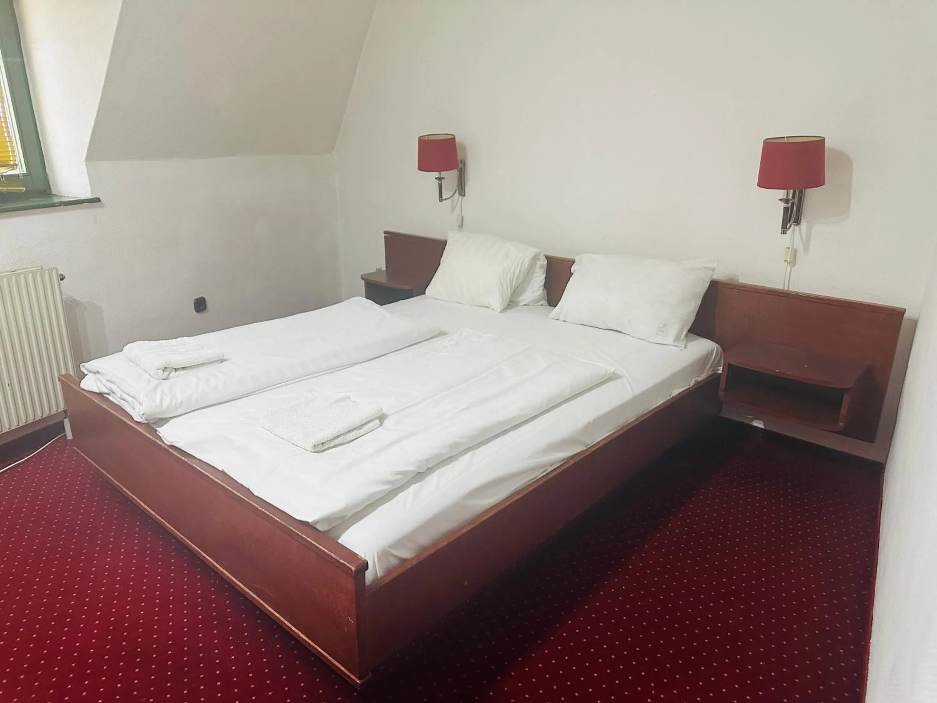 Bed in Hotel Amadeus