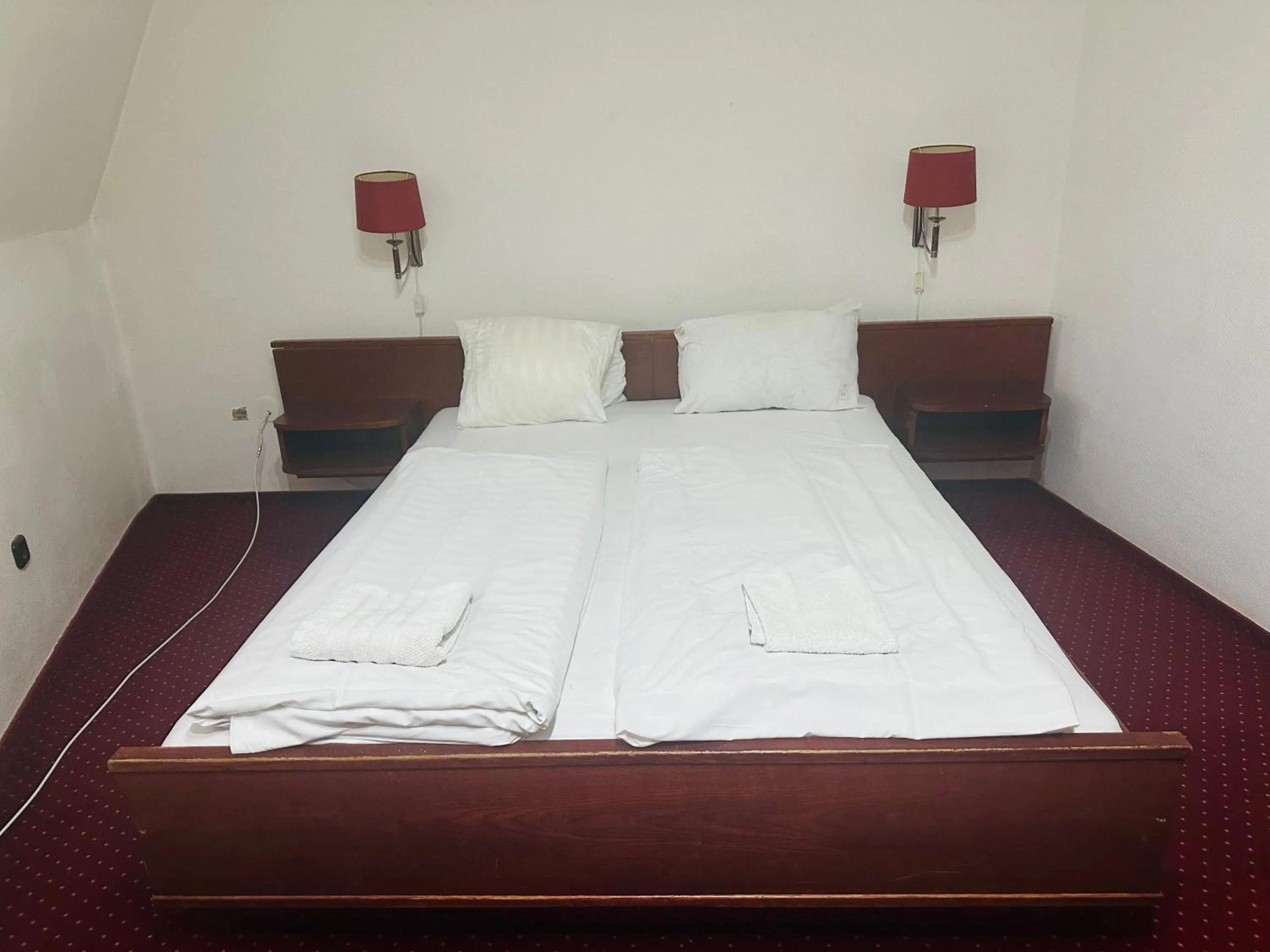 Bed in Hotel Amadeus