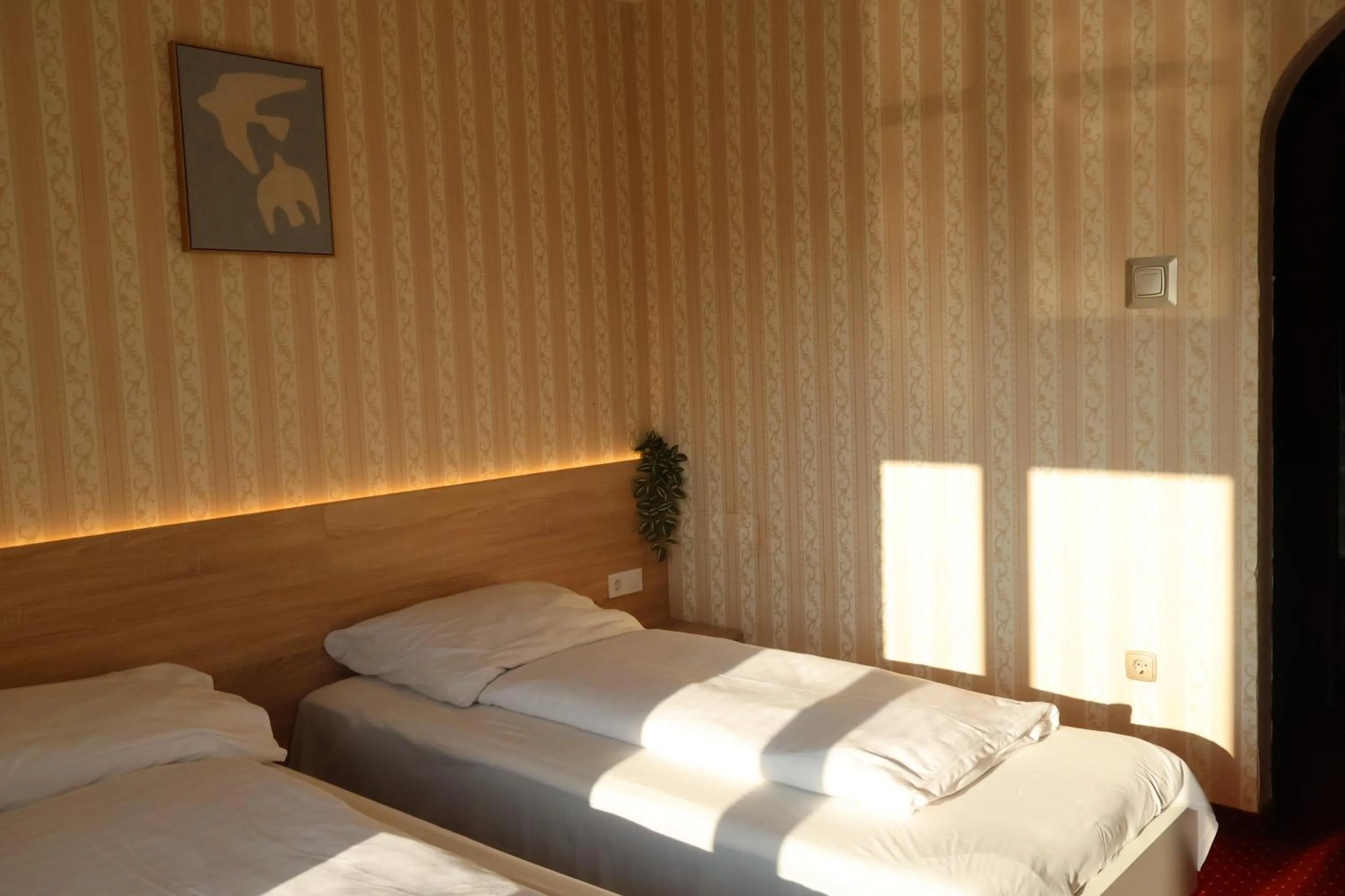 Bed in Hotel Amadeus