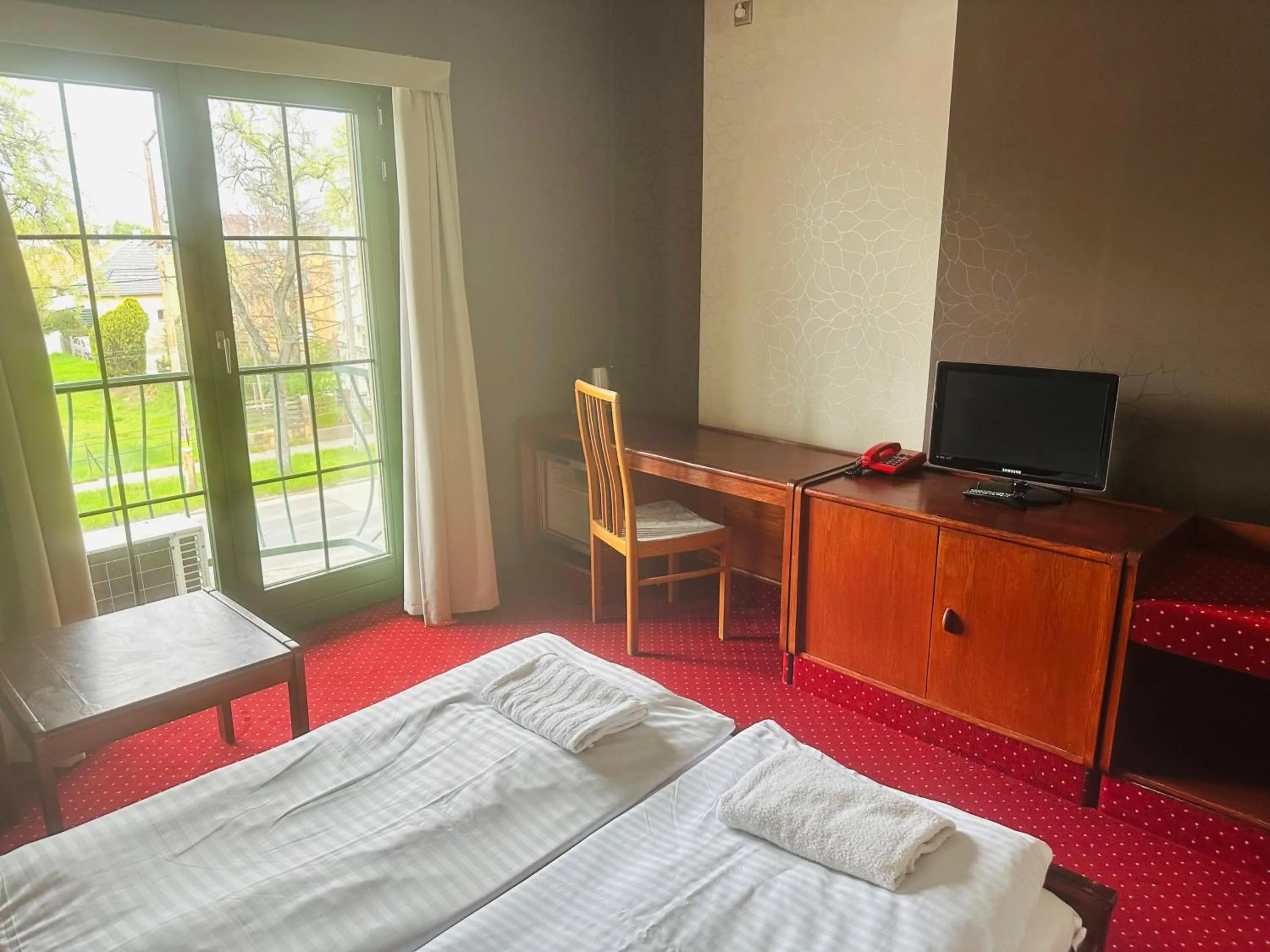 Bed in Hotel Amadeus