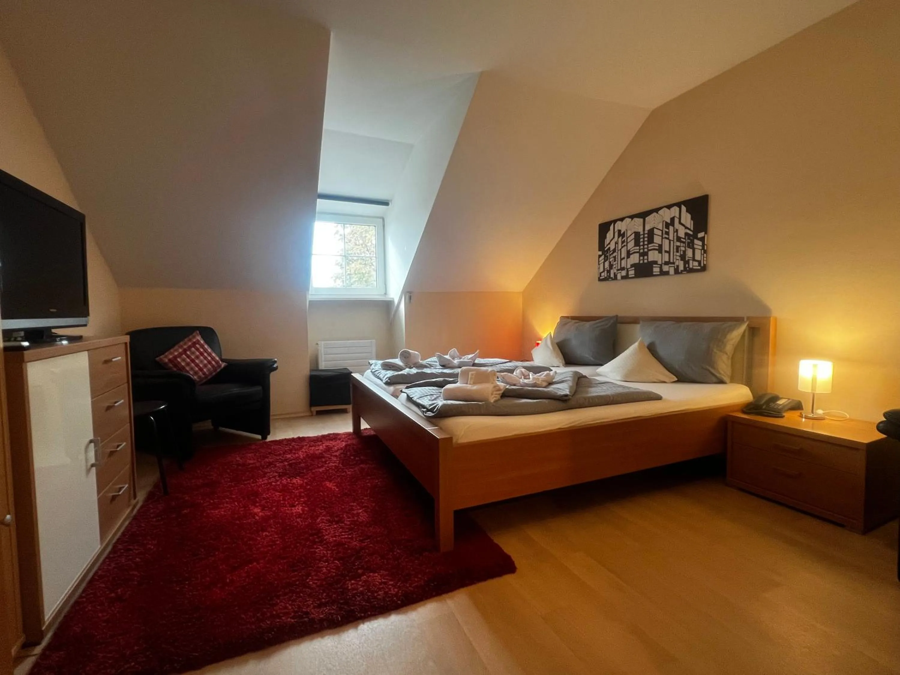 Photo of the whole room, Bed in Schloss Kirchham Appartement - & Wellnessanlage