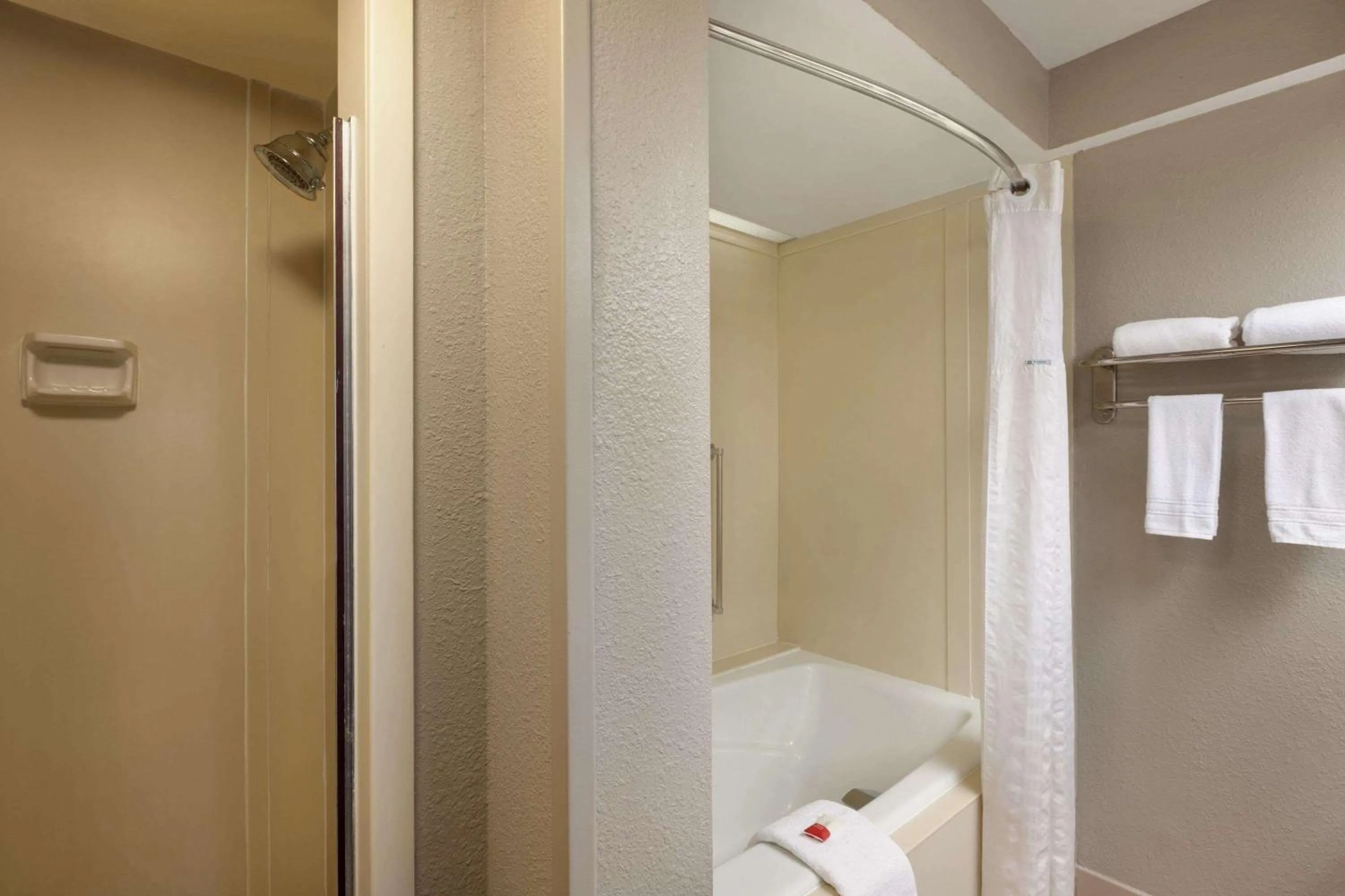 Bathroom in Ramada by Wyndham Augusta Fort Gordon