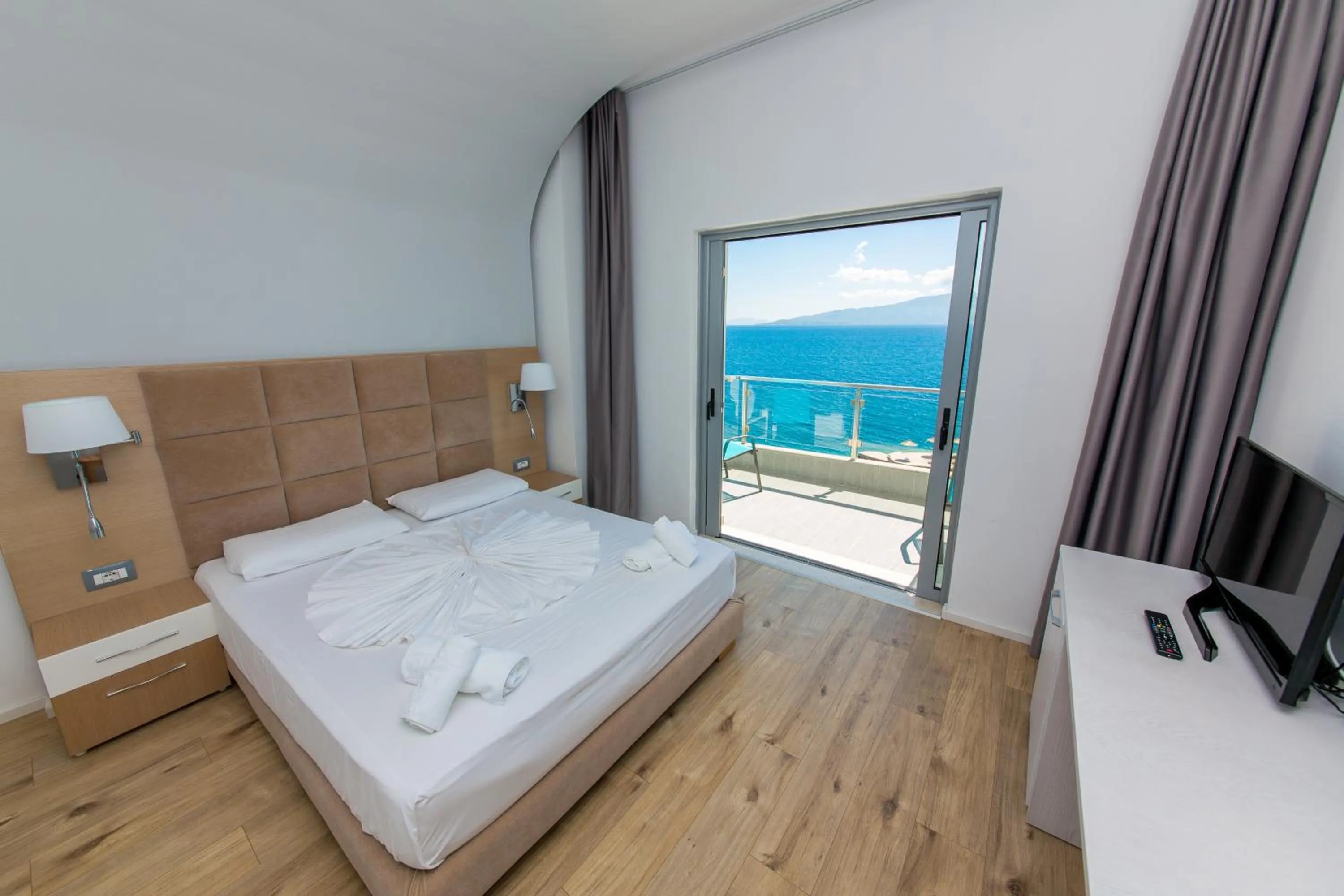 Photo of the whole room, Bed in Hotel Saranda Palace