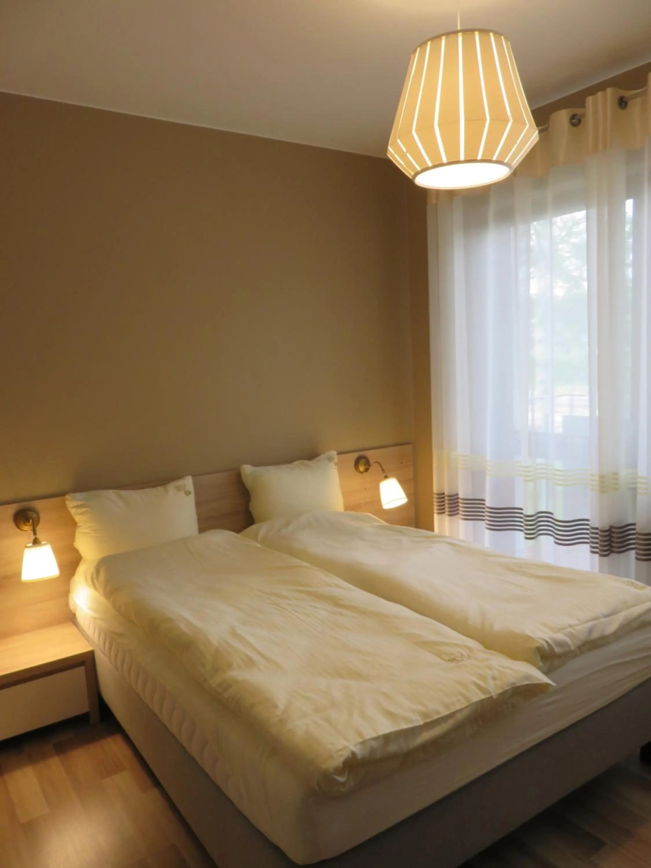 Bed in Rosa Apartamenty