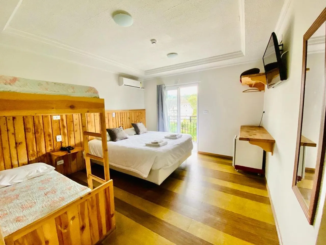 Bed in Pousada Primavera Campos do Jordao