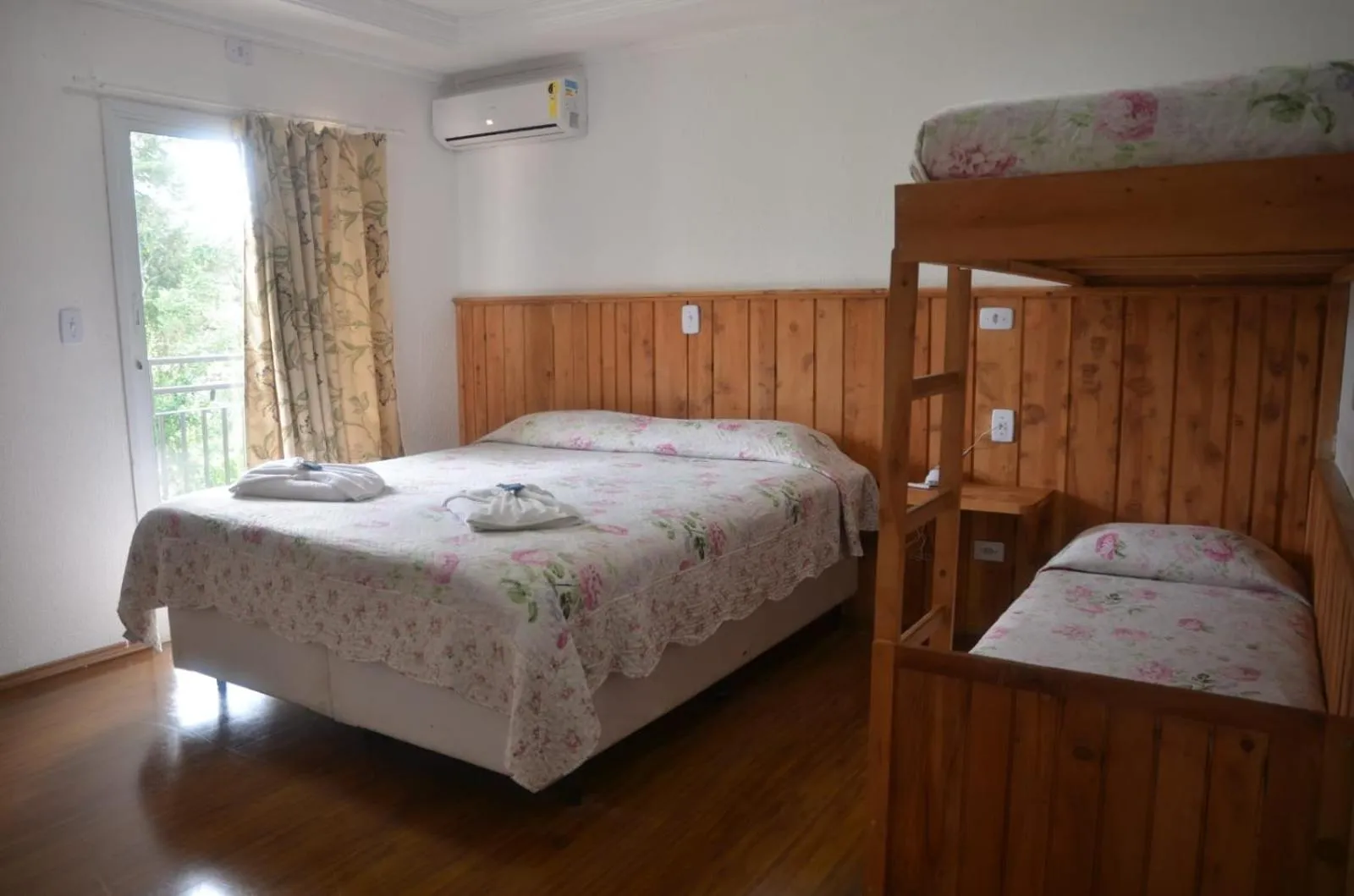 Bed in Pousada Primavera Campos do Jordao