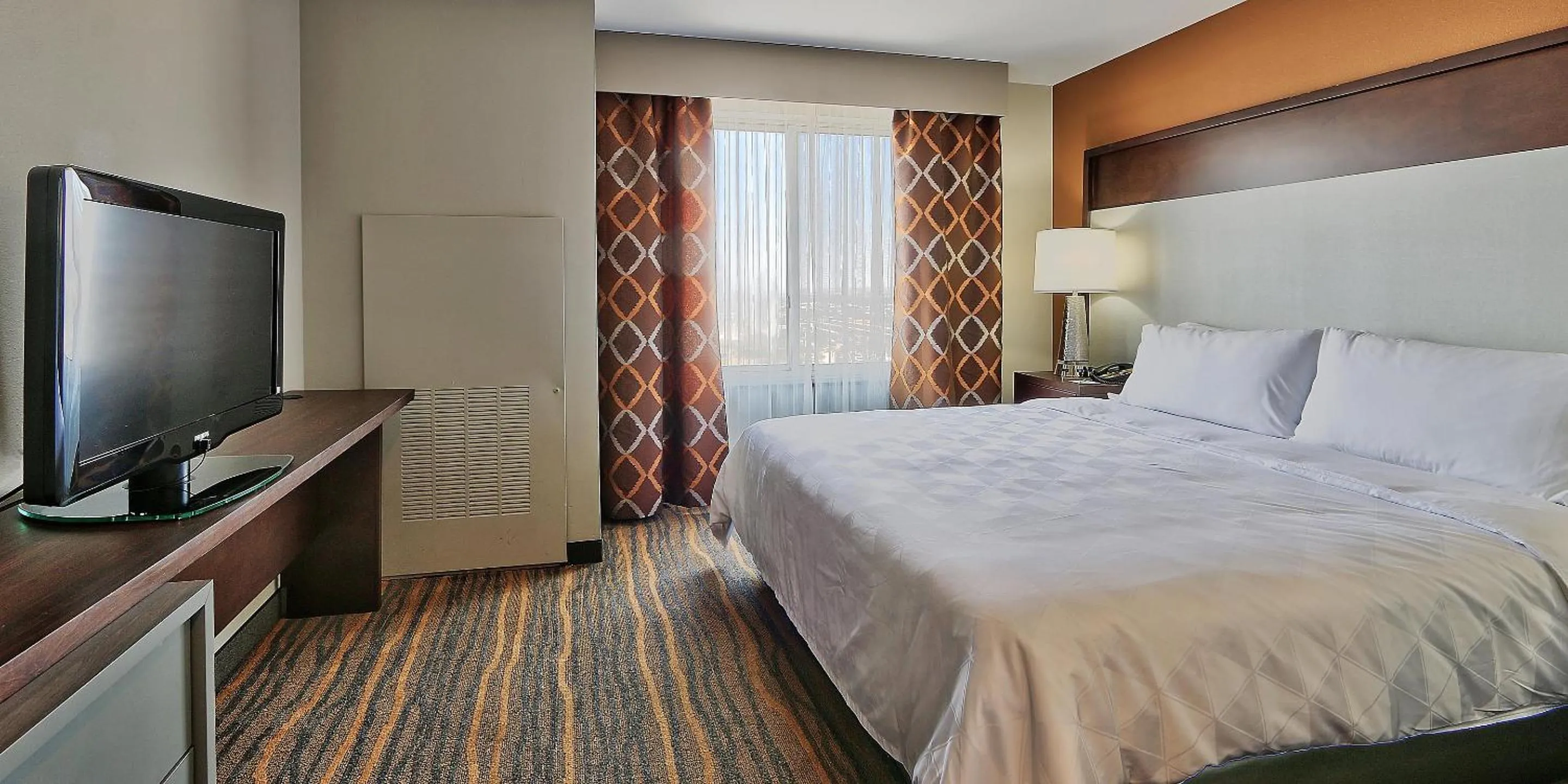 Bedroom, Bed in Holiday Inn & Suites Albuquerque-North I-25 by IHG
