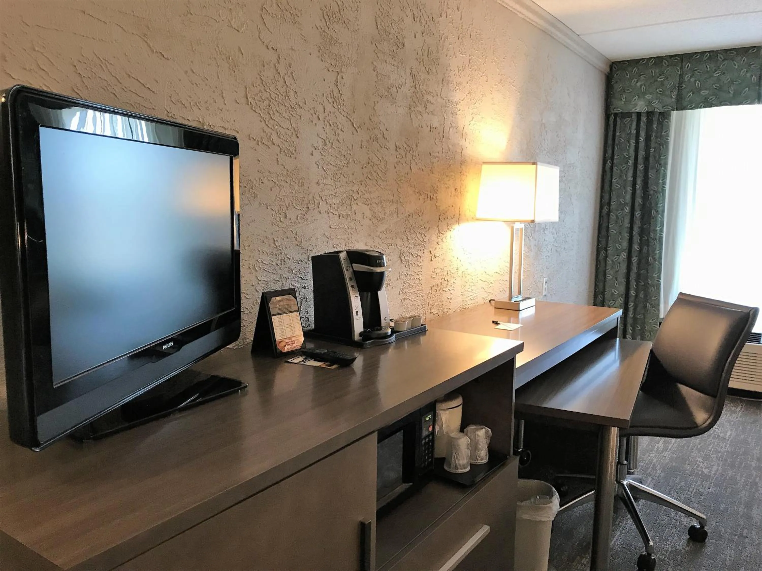 TV and multimedia in Country Inn & Suites by Radisson, Mt Pleasant-Racine West, WI