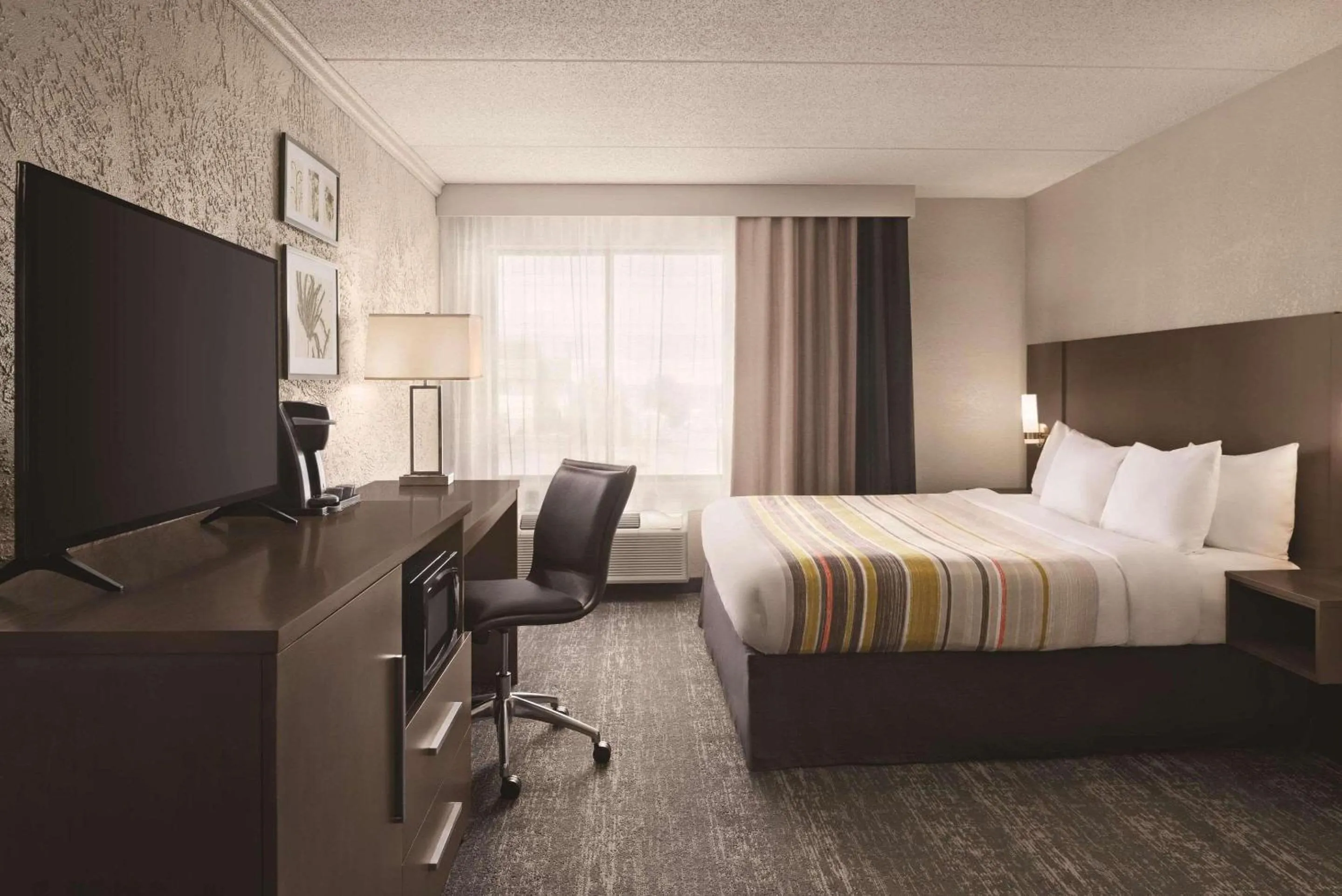 Bedroom, Bed in Country Inn & Suites by Radisson, Mt Pleasant-Racine West, WI