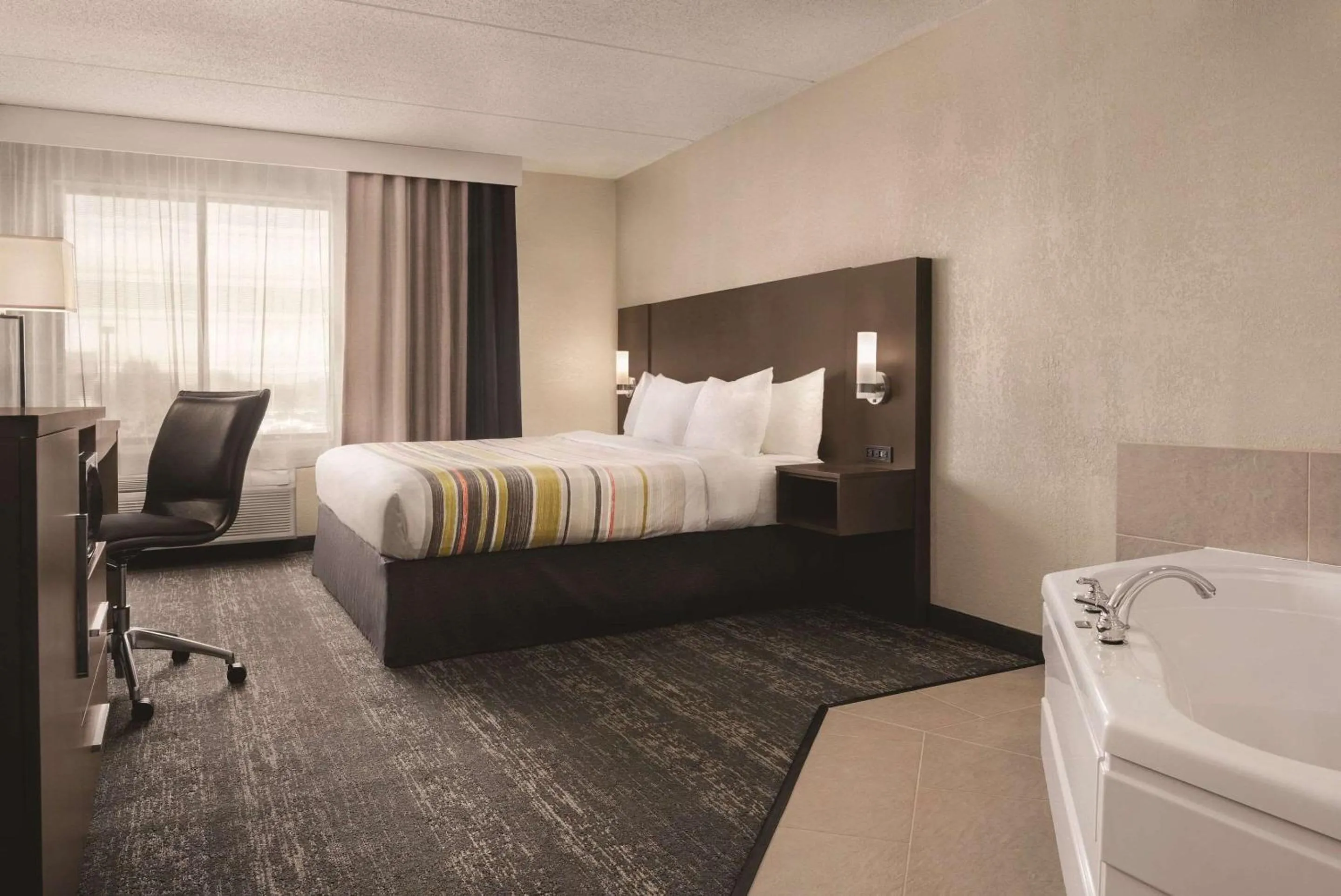 Bedroom, Bed in Country Inn & Suites by Radisson, Mt Pleasant-Racine West, WI