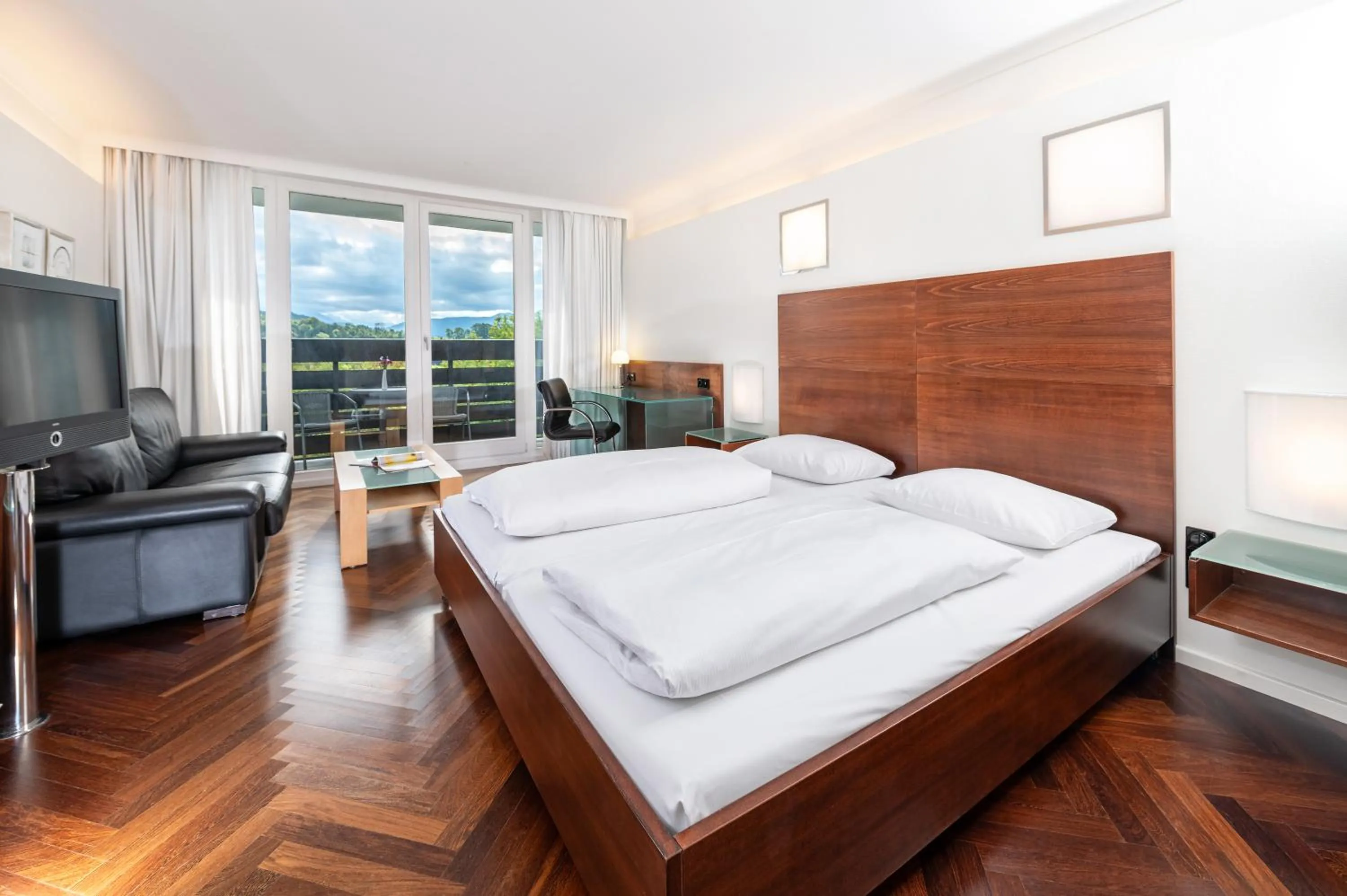 Photo of the whole room, Bed in AllgäuStern Hotel