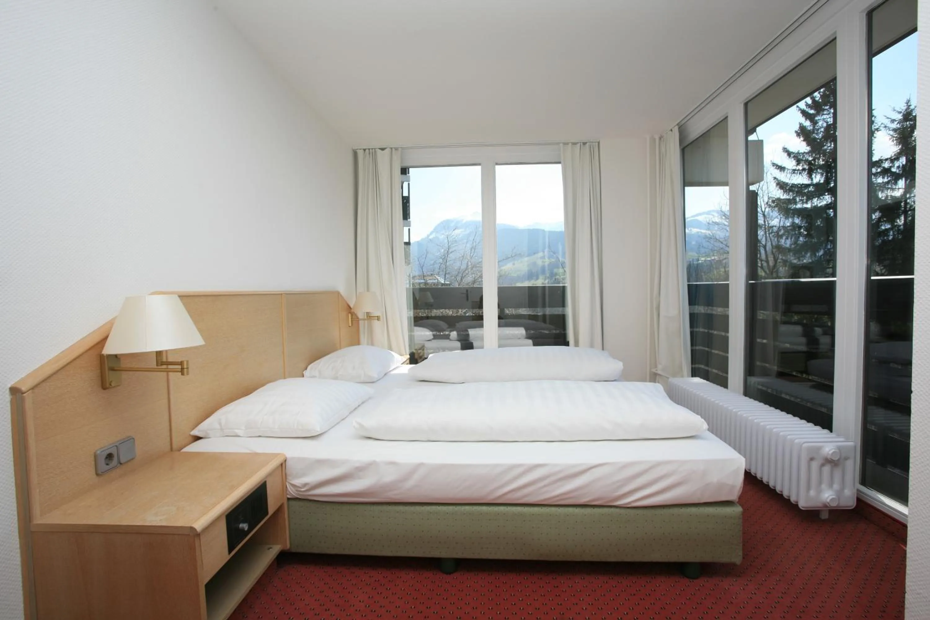 Bedroom, Bed in AllgäuStern Hotel