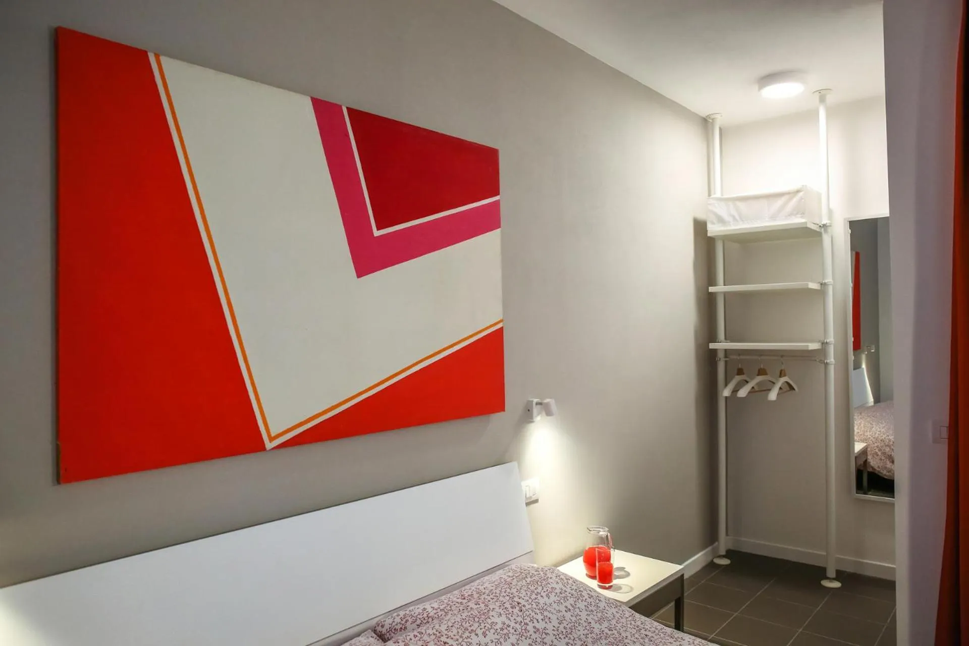 Decorative detail, Bed in B&B WarmUp Grosseto - Parcheggio incluso nella corte interna