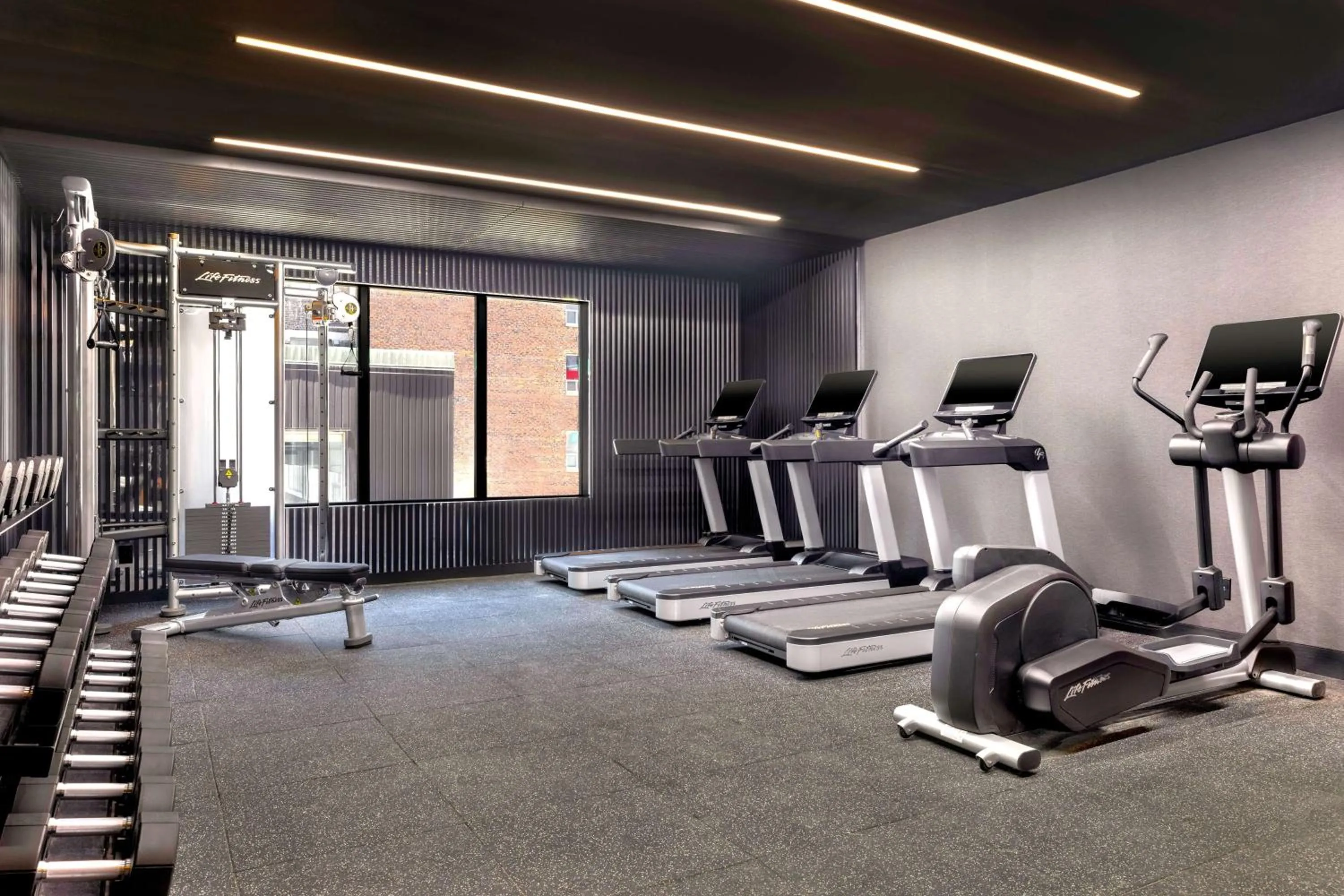 Fitness centre/facilities in Revery Toronto Downtown, Curio Collection by Hilton