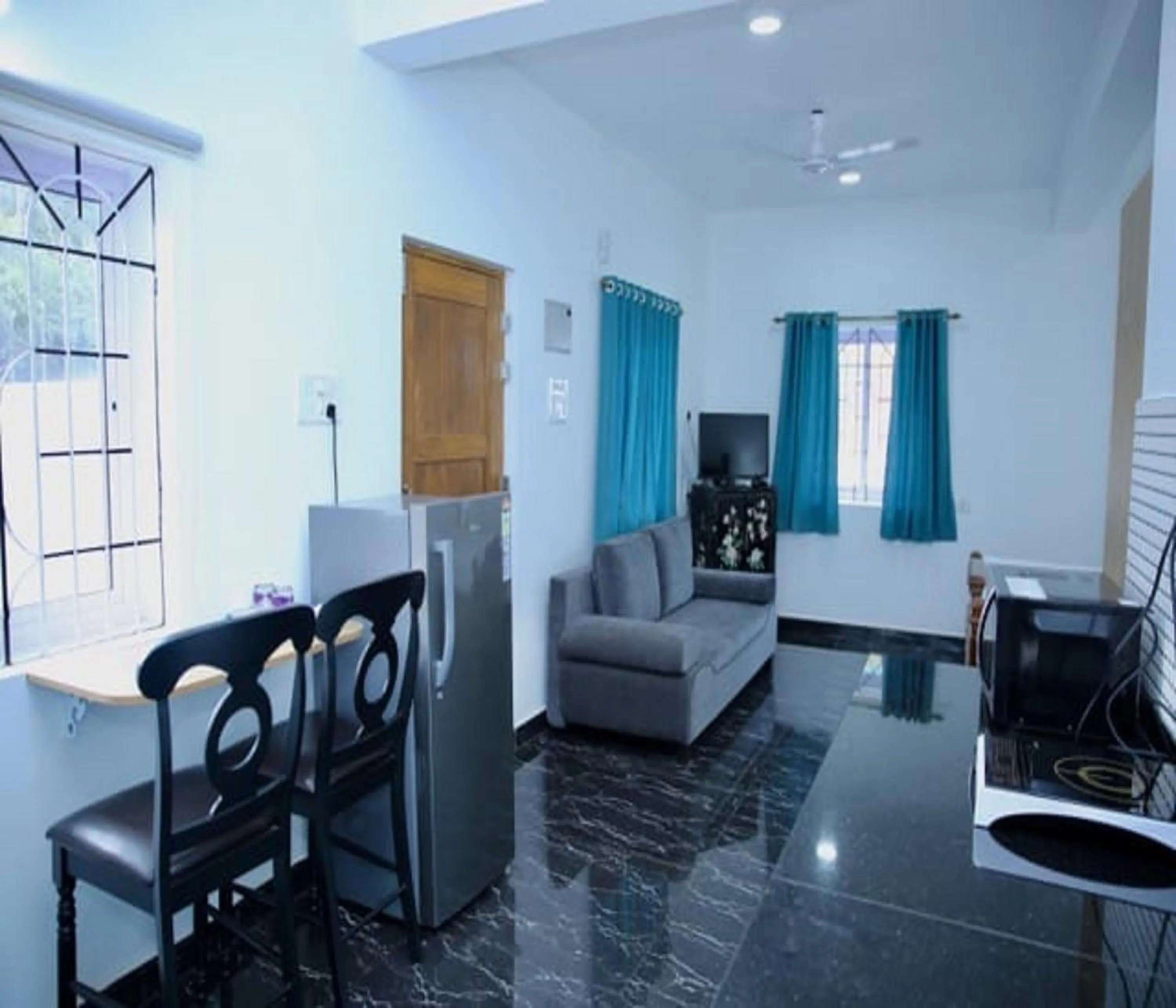 Living room in Lar Amorosa Boutique Hotel - Goa