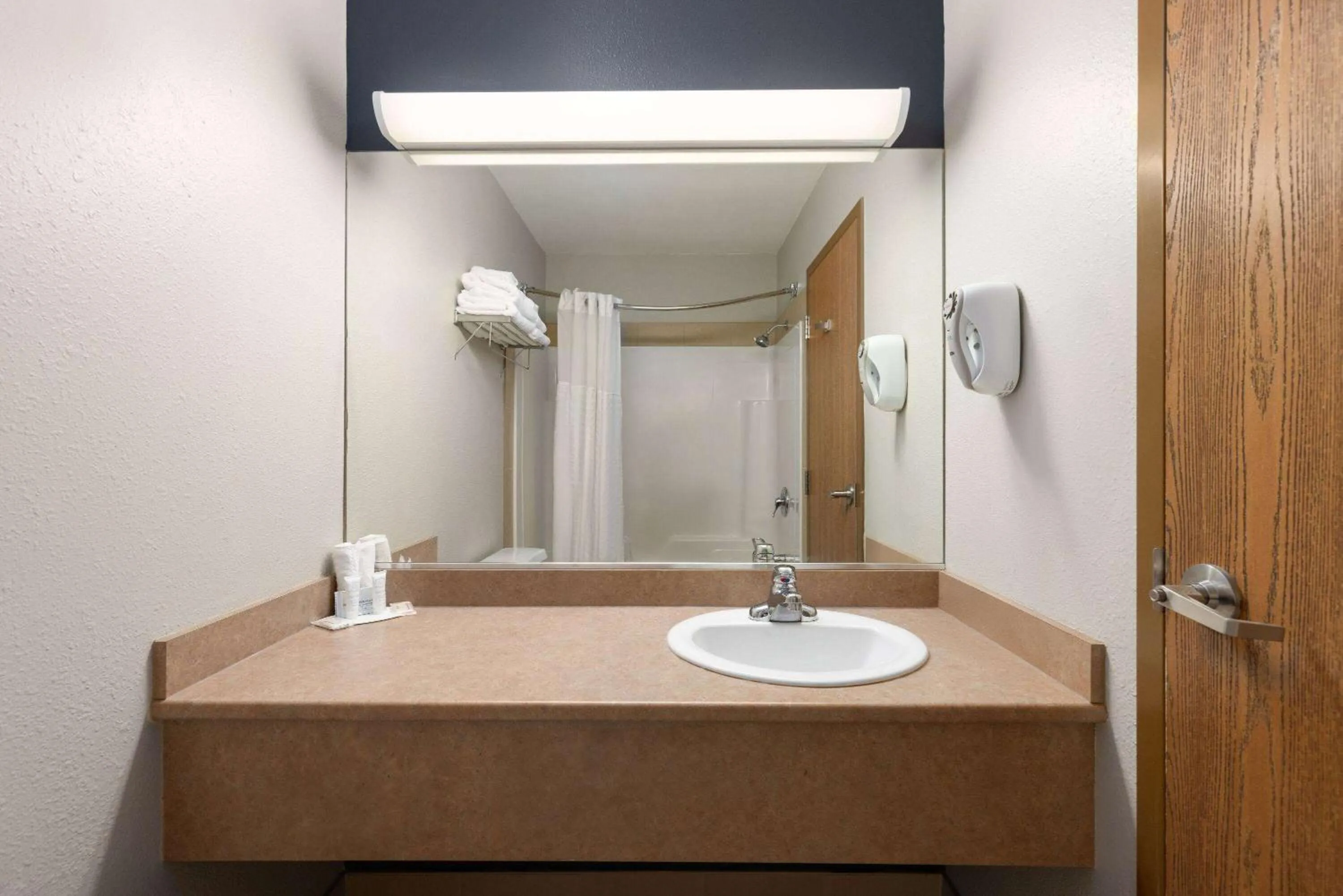 Bathroom in Super 8 by Wyndham St-Jerome