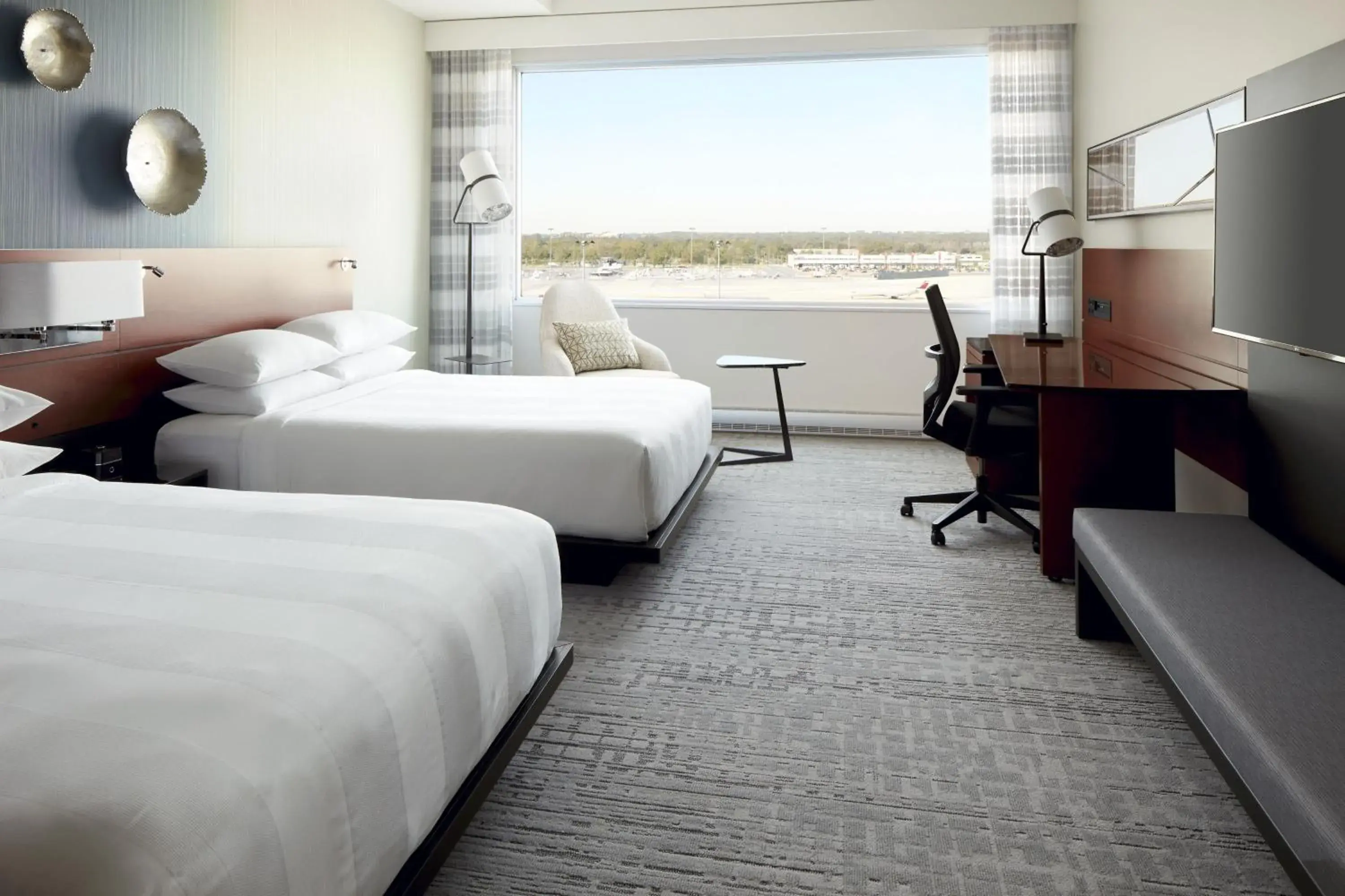 Guest Room with Two Queen Beds and Airport View in Marriott Montreal Airport In-Terminal Hotel Guest Room with Two Queen Beds and Airport View in Marriott Montreal Airport In-Terminal Hotel