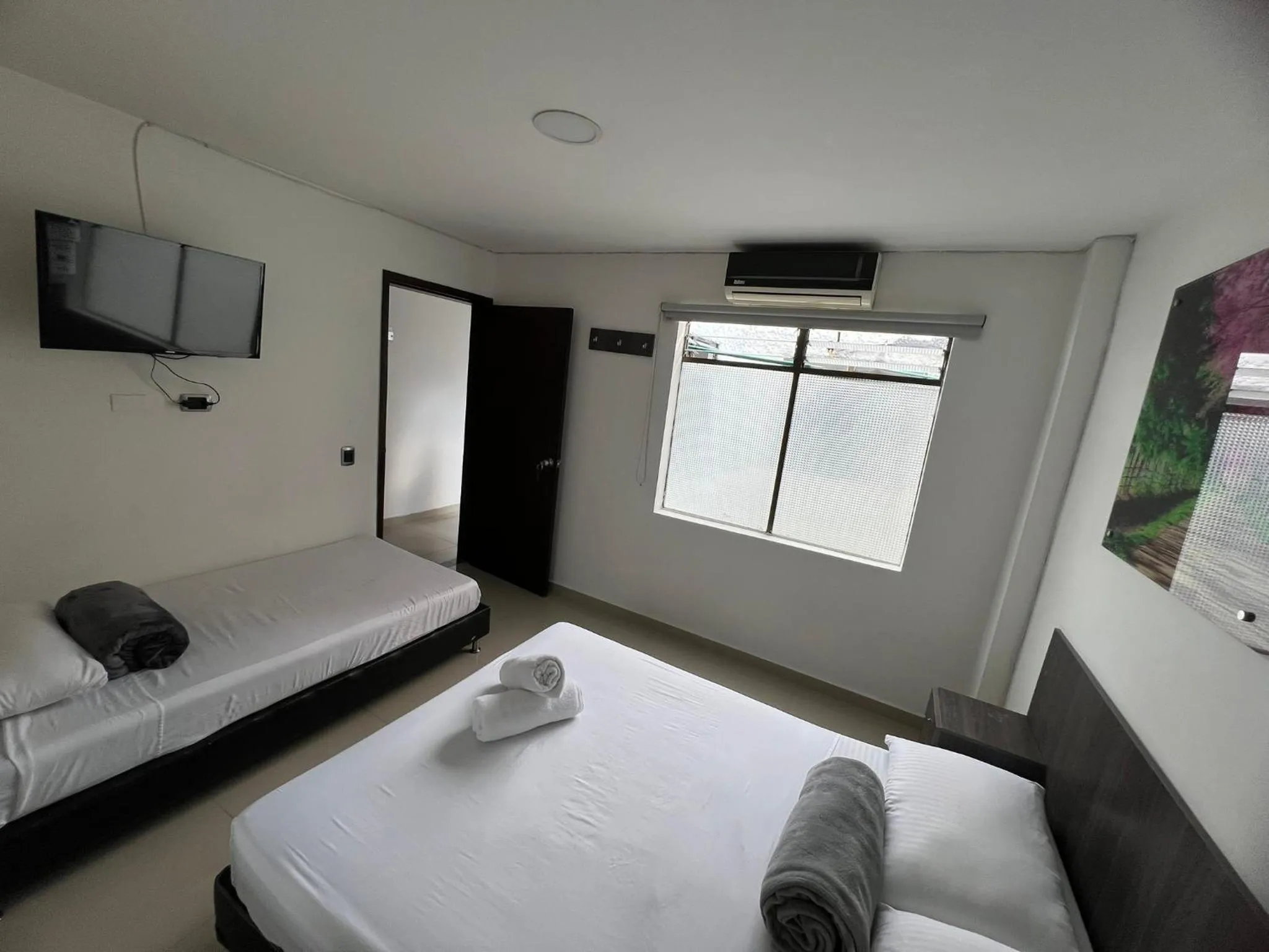 Photo of the whole room, Bed in Hotel Jardin de Laureles Jeps