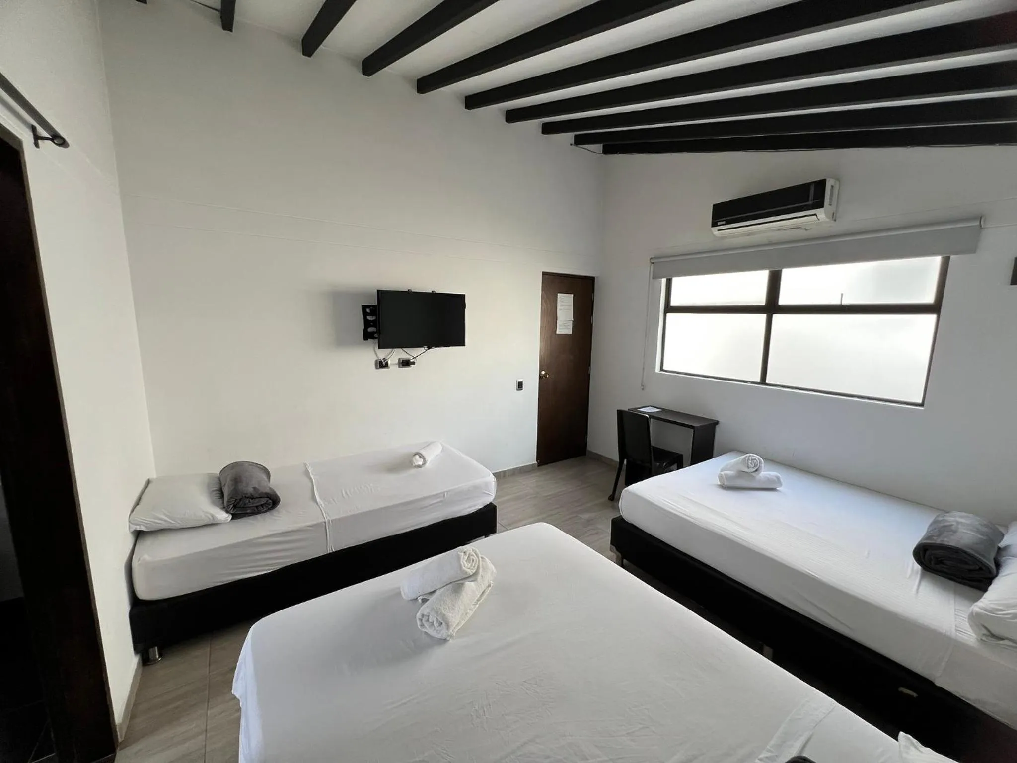 Photo of the whole room, Bed in Hotel Jardin de Laureles Jeps