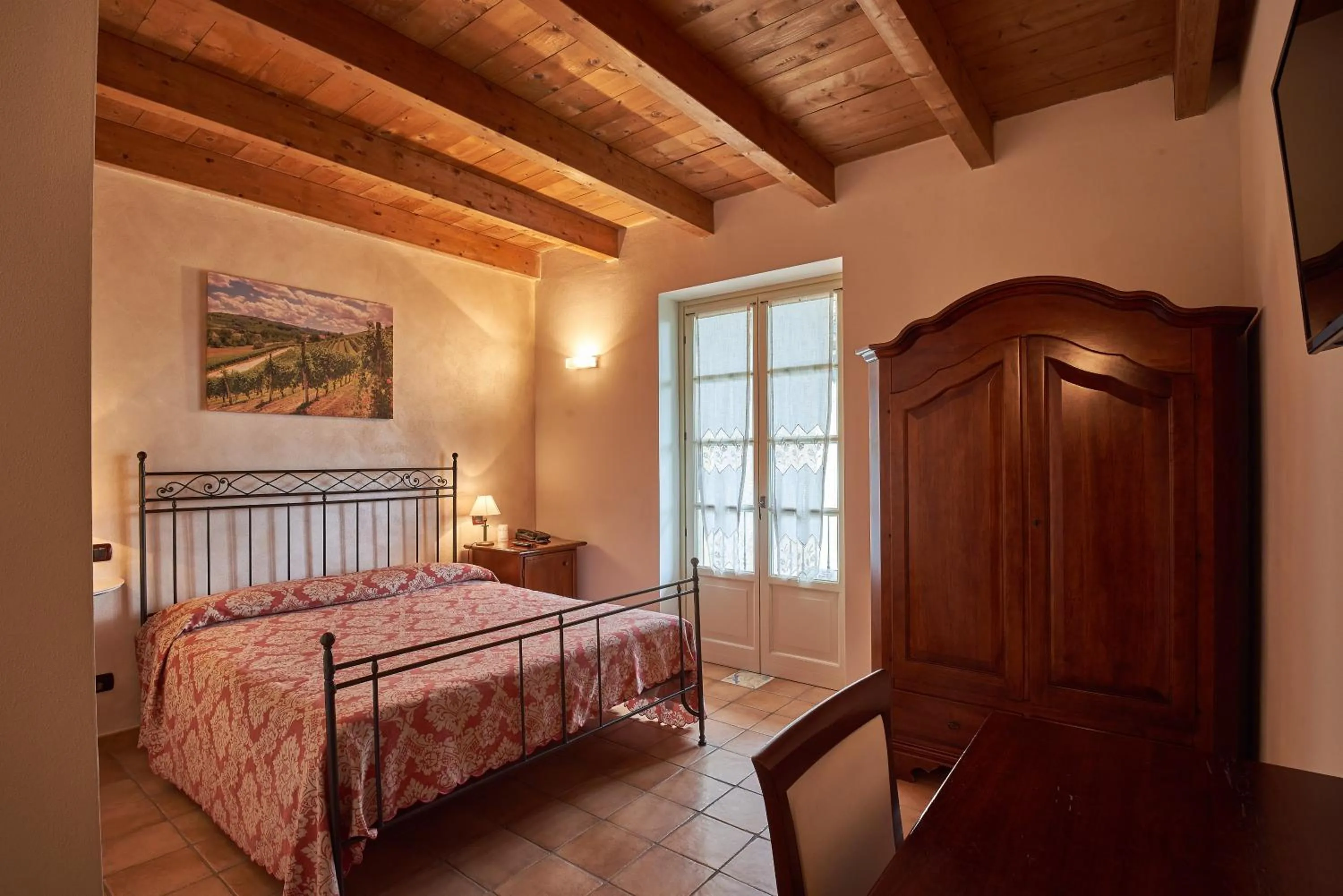 King Room with Balcony in Agriturismo Podere La Piazza
