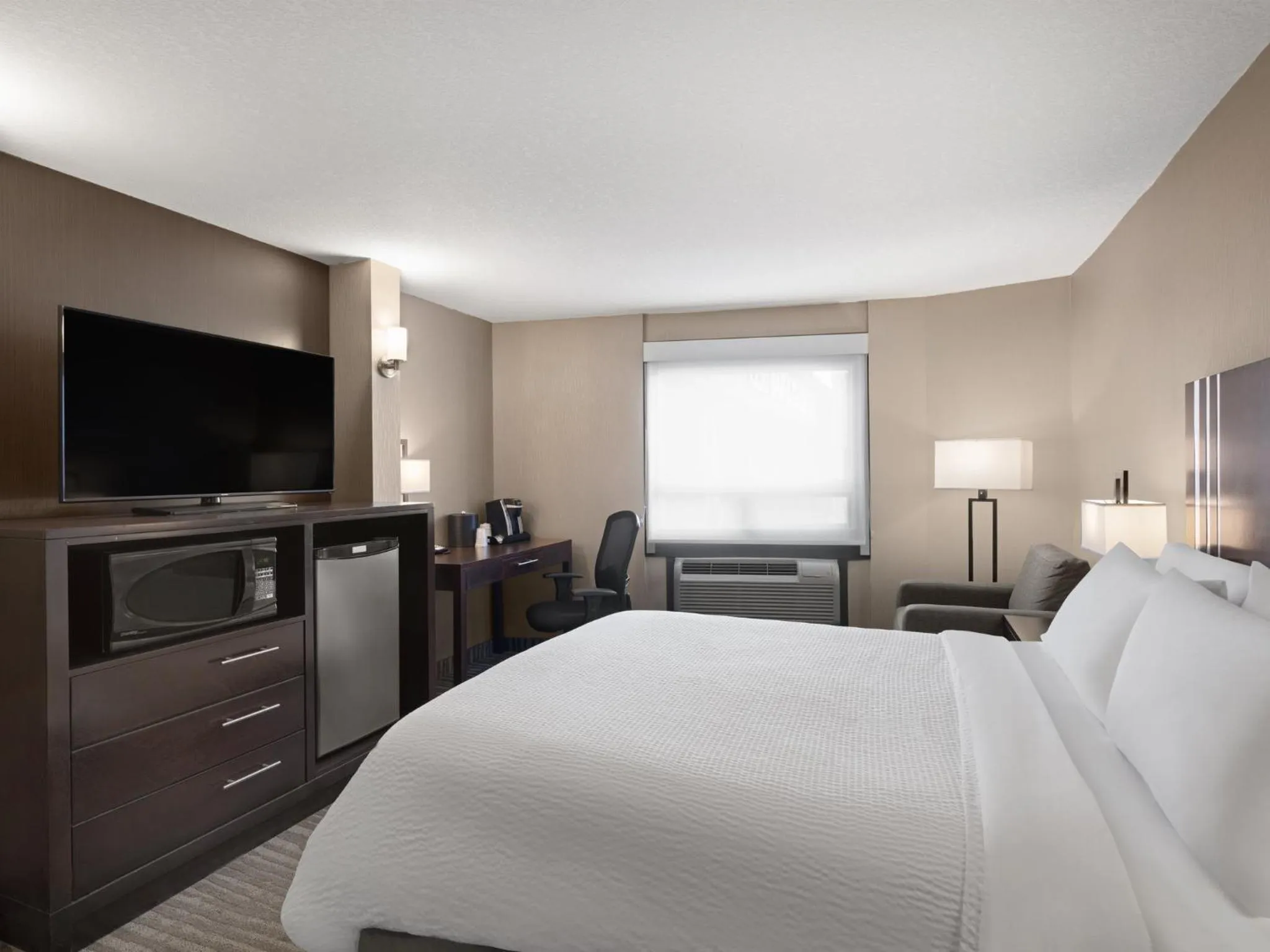 Photo of the whole room, Bed in Holiday Inn Calgary Airport by IHG