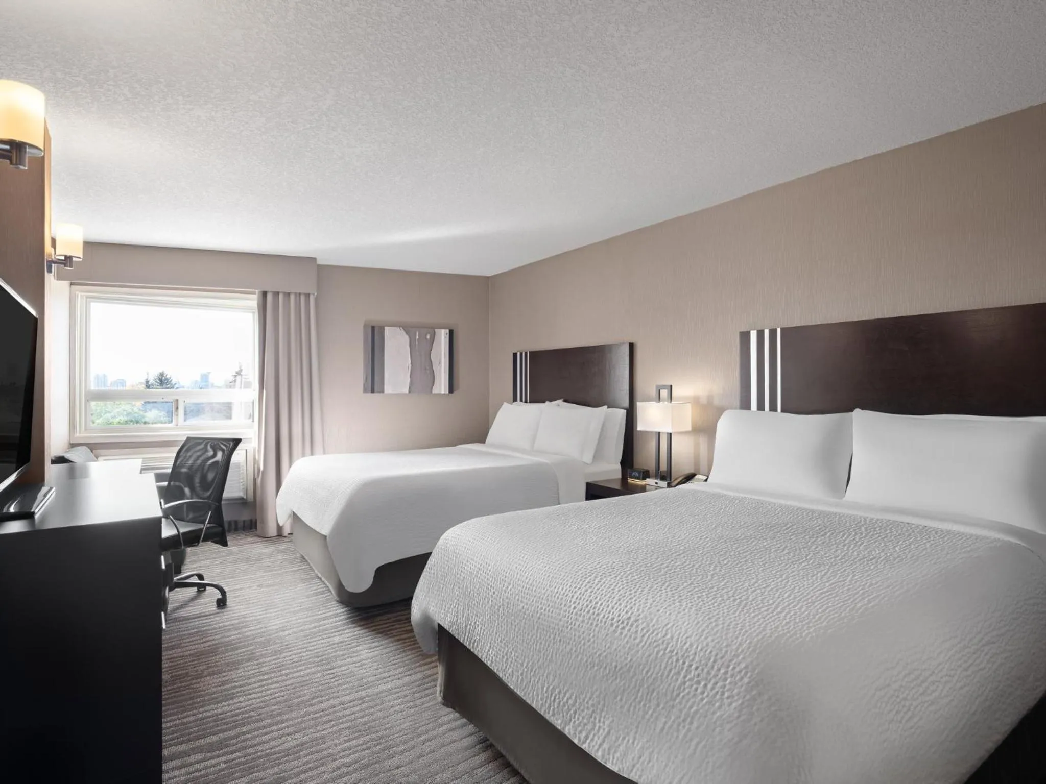 Photo of the whole room, Bed in Holiday Inn Calgary Airport by IHG