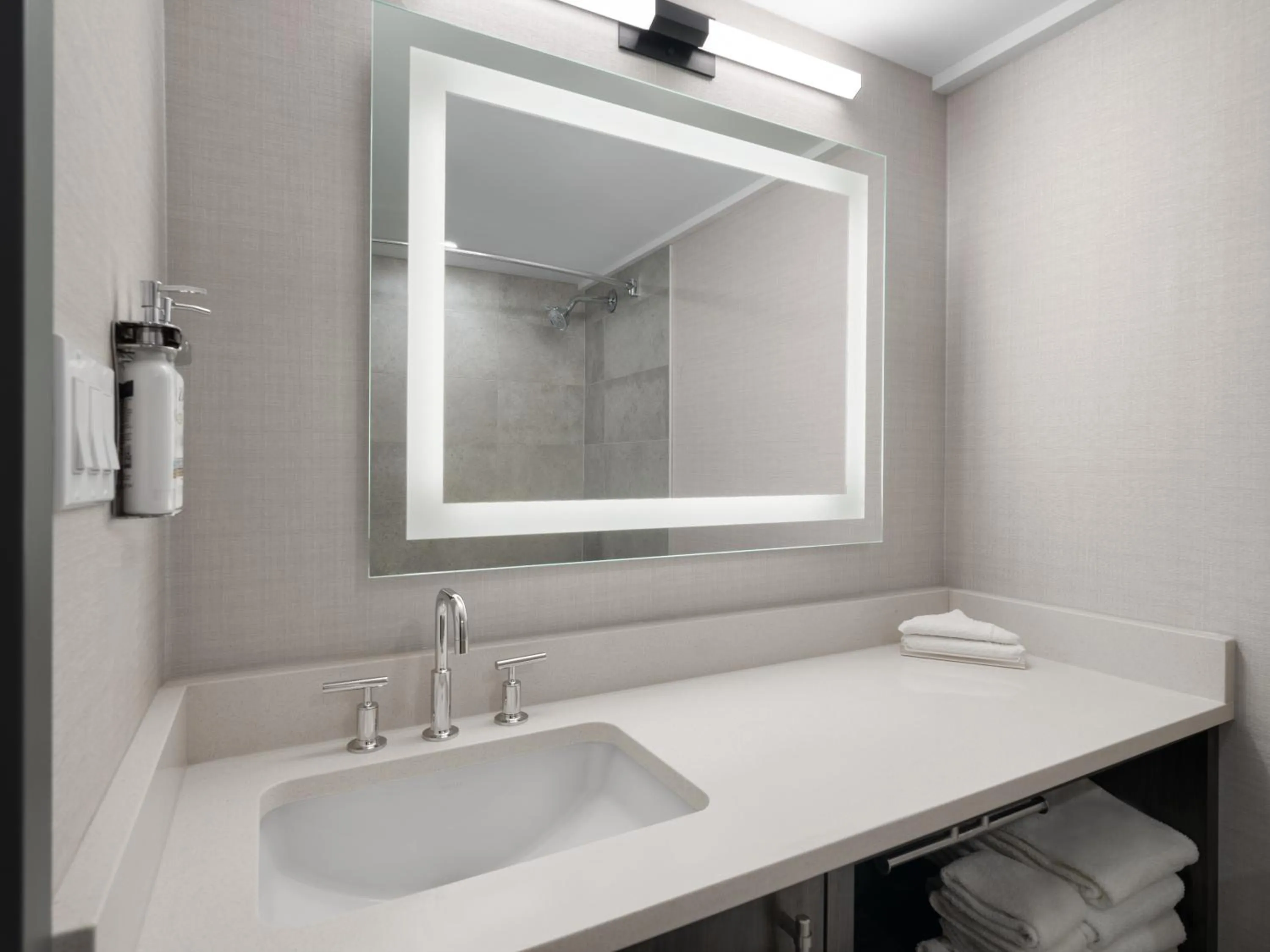 Bathroom in Holiday Inn Calgary Airport by IHG