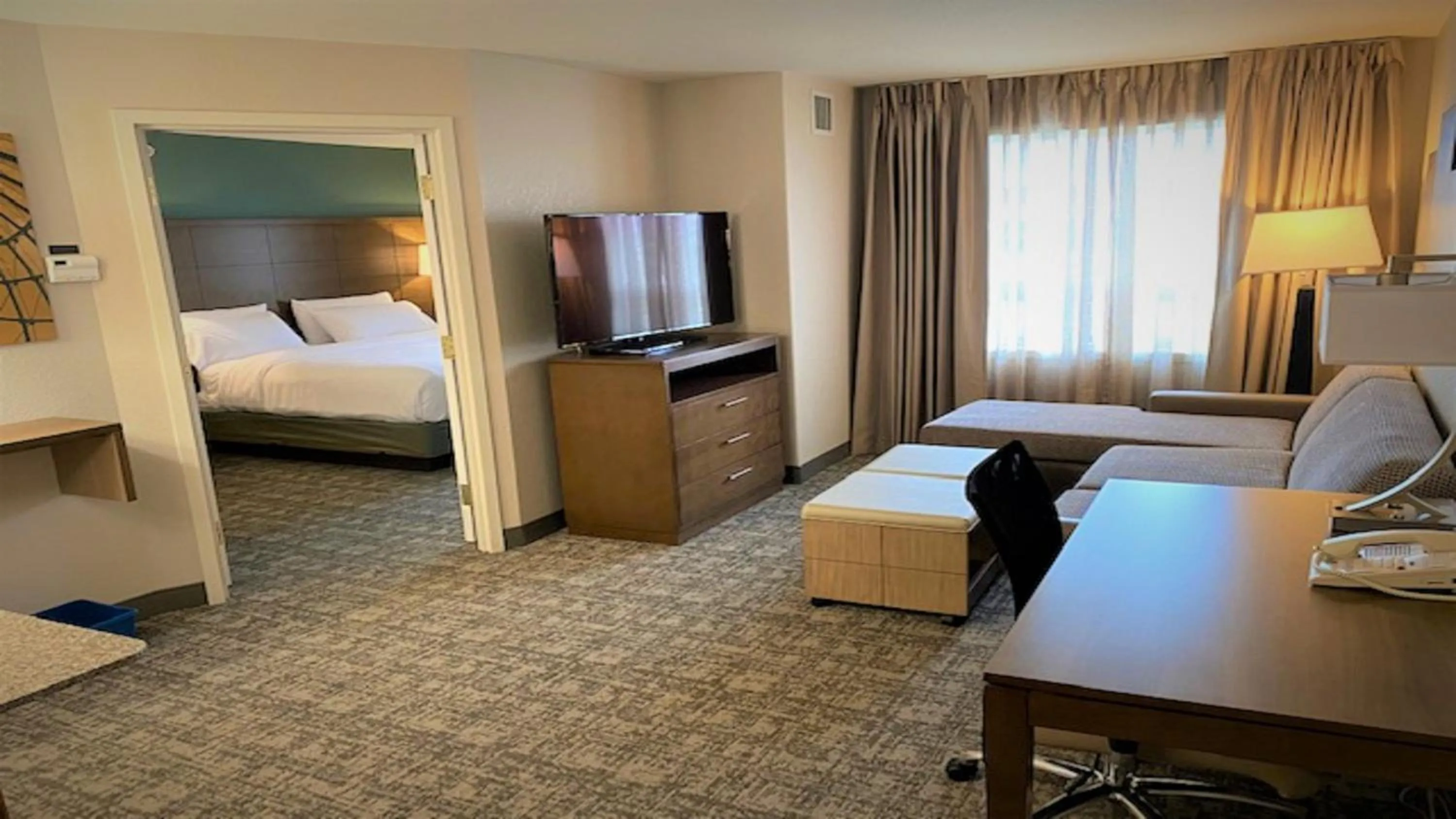 Photo of the whole room, Bed in Staybridge Suites - Calgary Airport by IHG