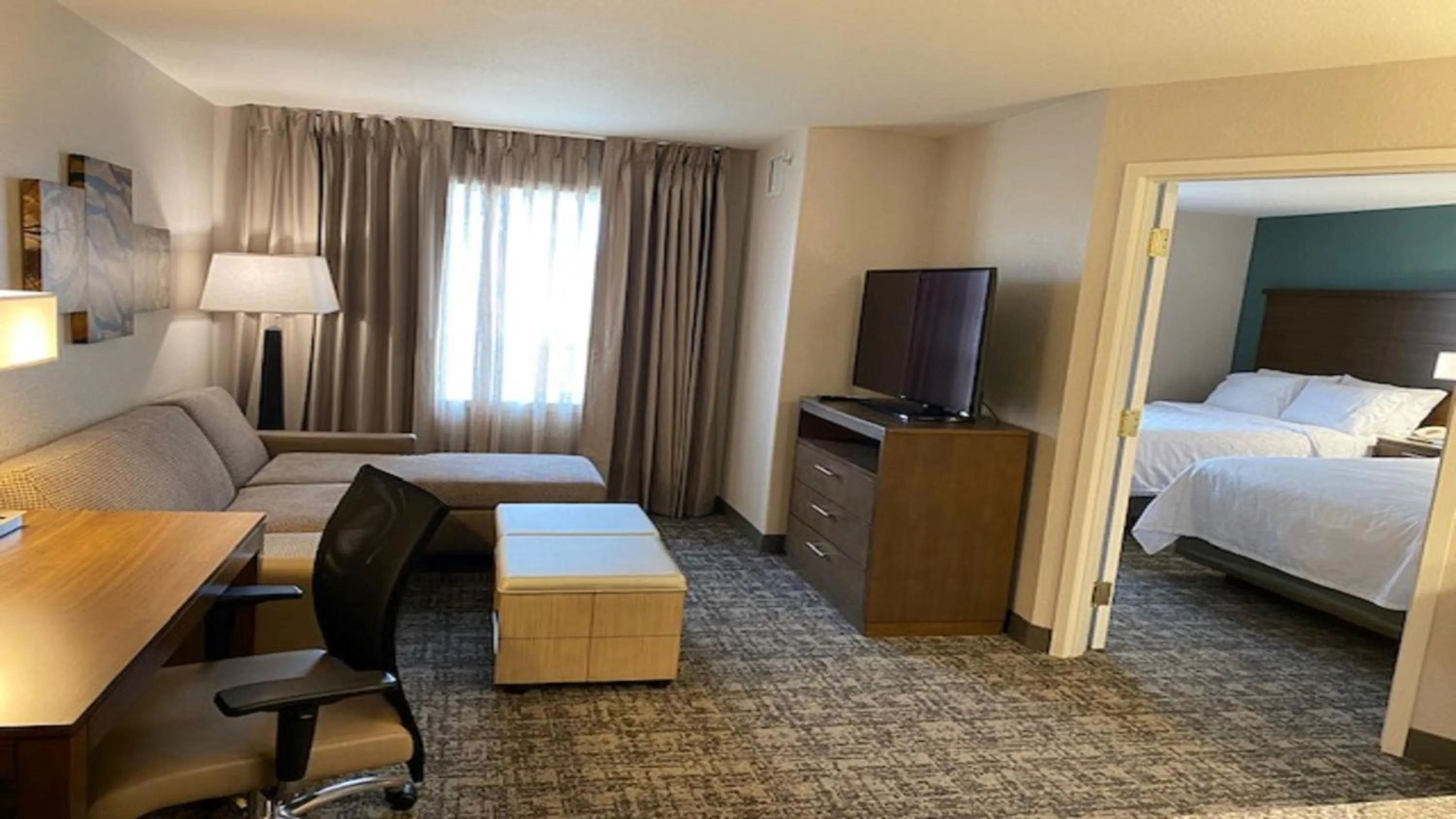 Photo of the whole room, Bed in Staybridge Suites - Calgary Airport by IHG