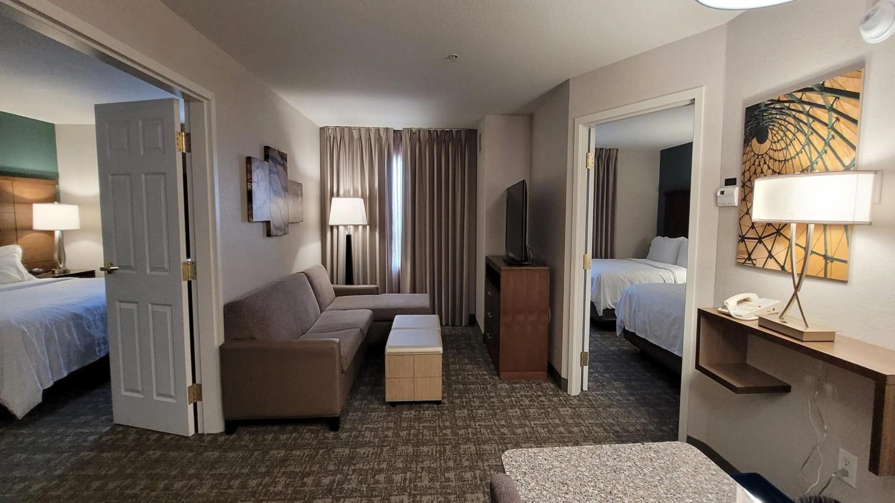 Photo of the whole room, Bed in Staybridge Suites - Calgary Airport by IHG