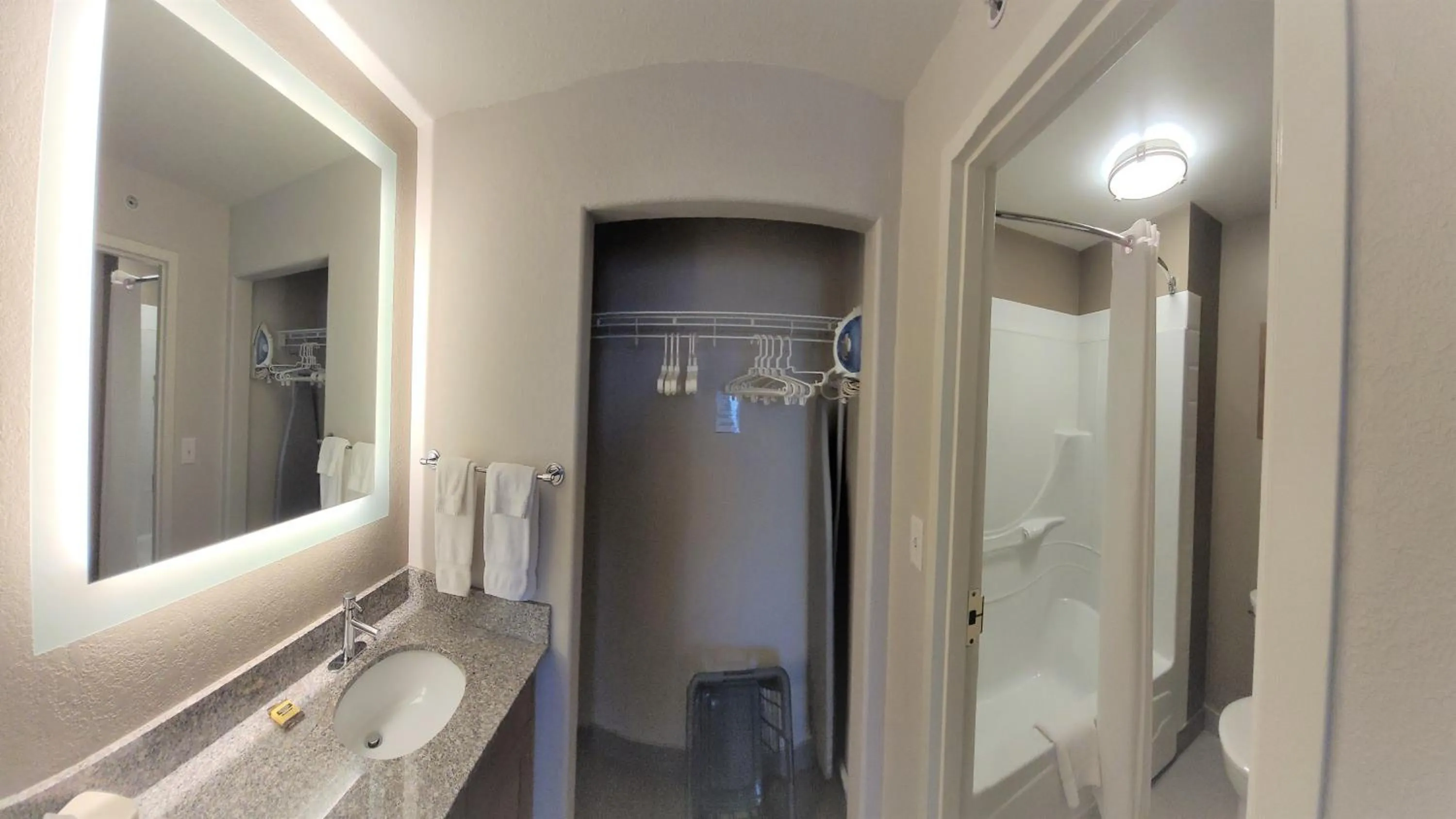 Bathroom in Staybridge Suites - Calgary Airport by IHG