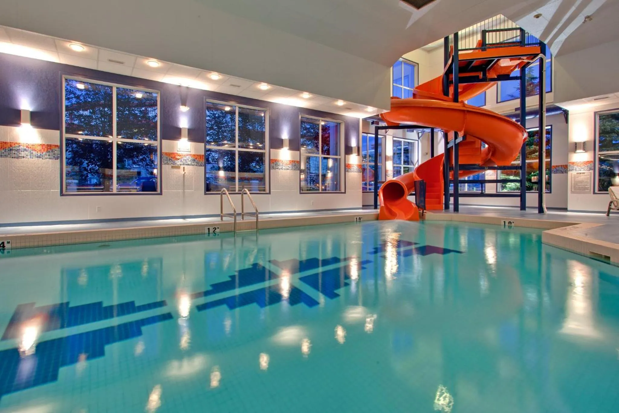 Swimming pool in Holiday Inn Express Calgary South by IHG