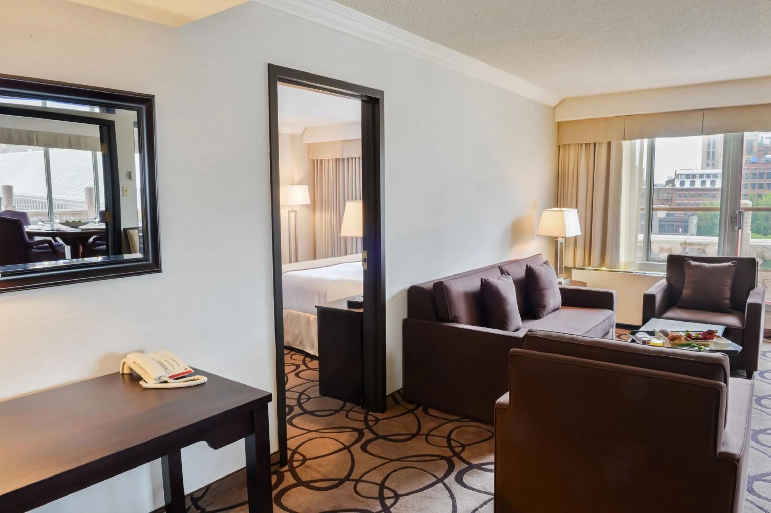 Living room, Bed in Holiday Inn Montreal Centre Ville Downtown by IHG