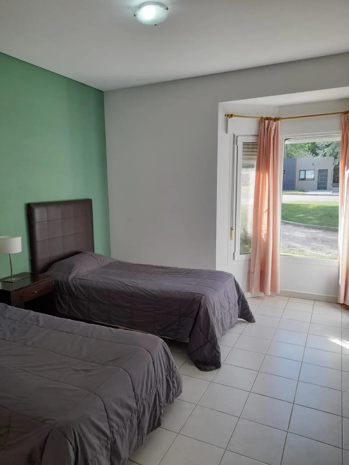 Bed in Los Robles Apart Hotel