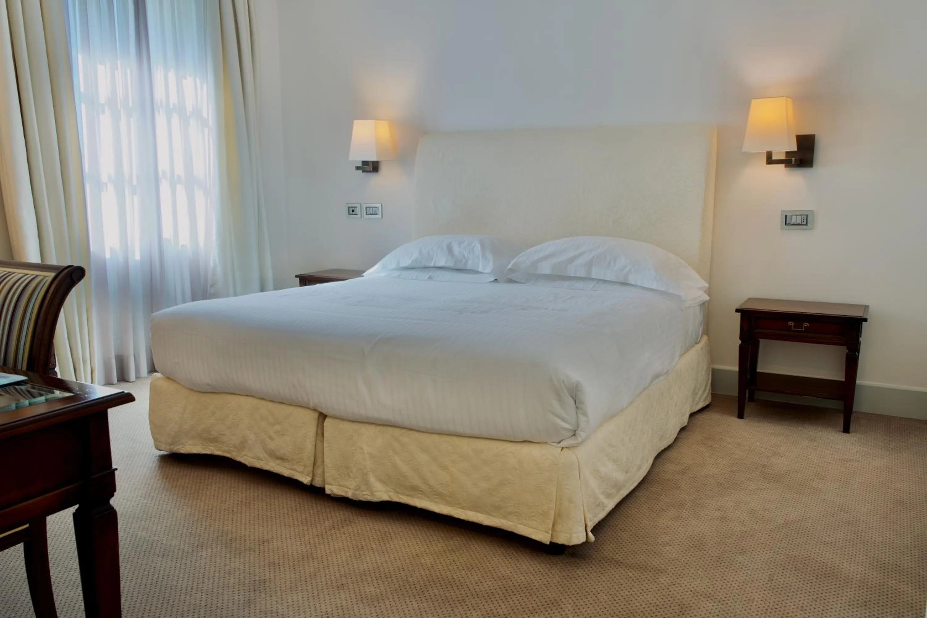 Bedroom, Bed in Grand Hotel della Posta, WorldHotels Distinctive