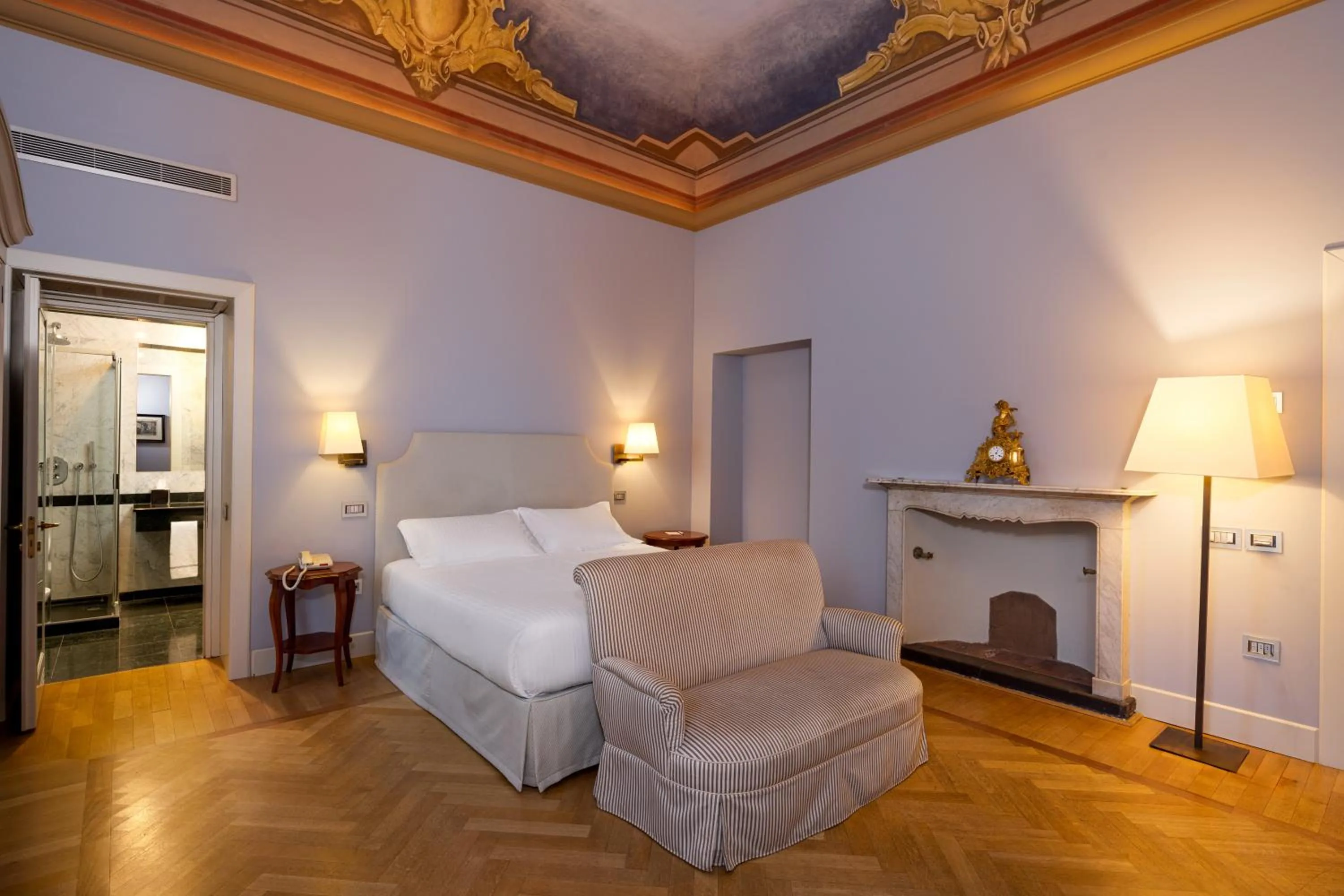 Bed in Grand Hotel della Posta, WorldHotels Distinctive