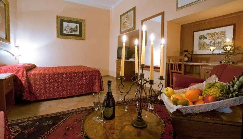 Bedroom in Hermitage Capua Hotel