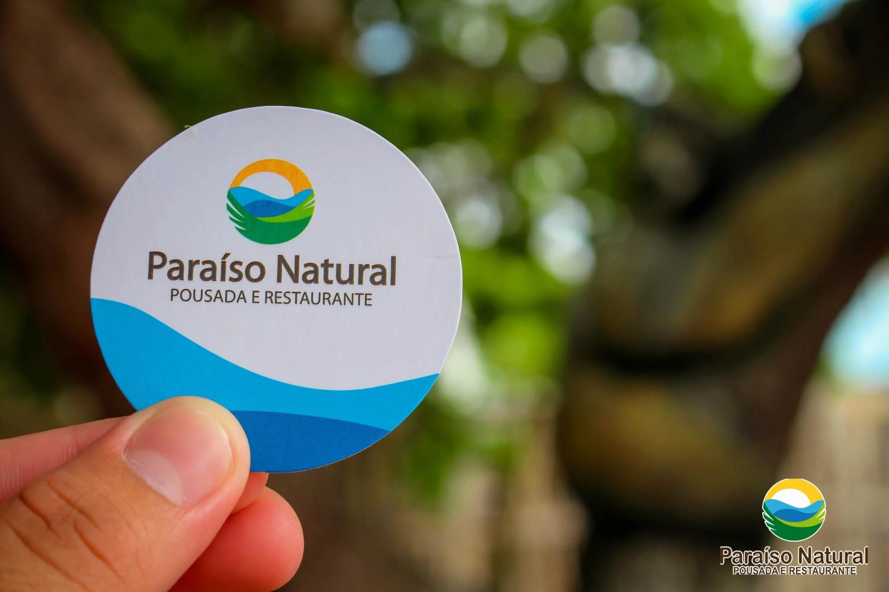 Property logo or sign in Pousada e Restaurante Paraíso Natural