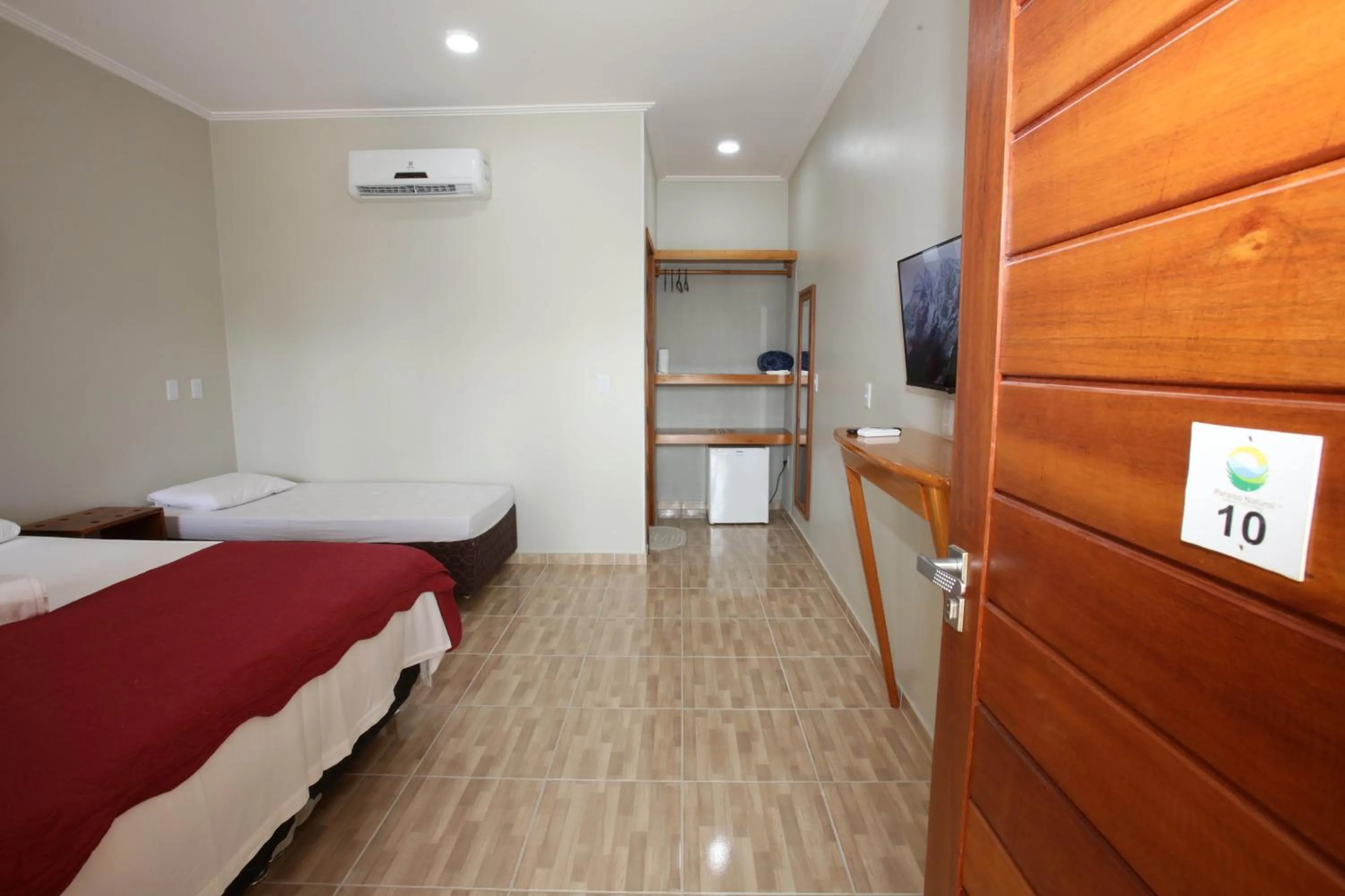 Bed in Pousada e Restaurante Paraíso Natural