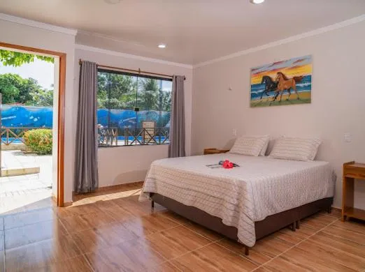 Photo of the whole room, Bed in Pousada e Restaurante Paraíso Natural