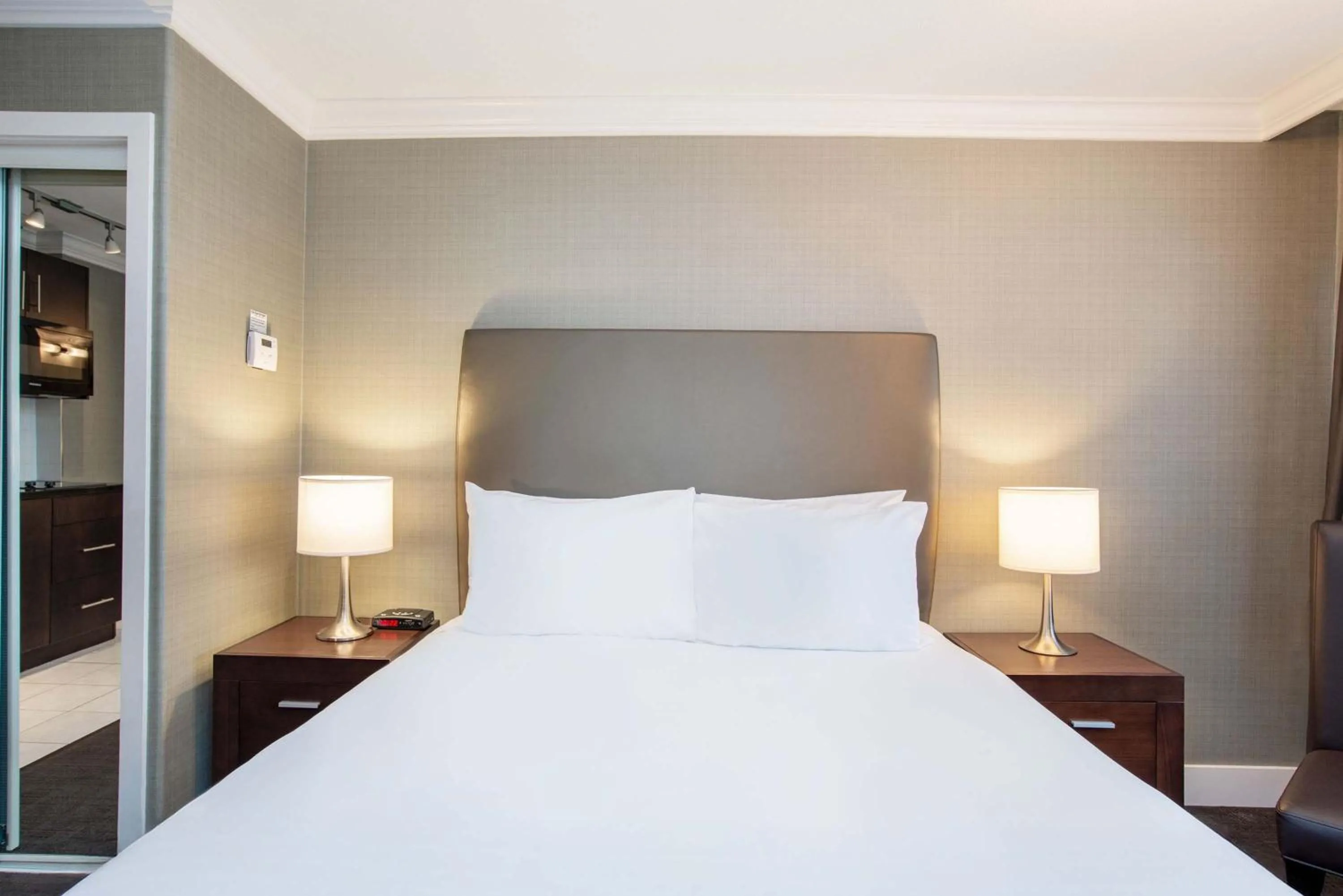 Photo of the whole room, Bed in Sandman Hotel Vancouver Airport