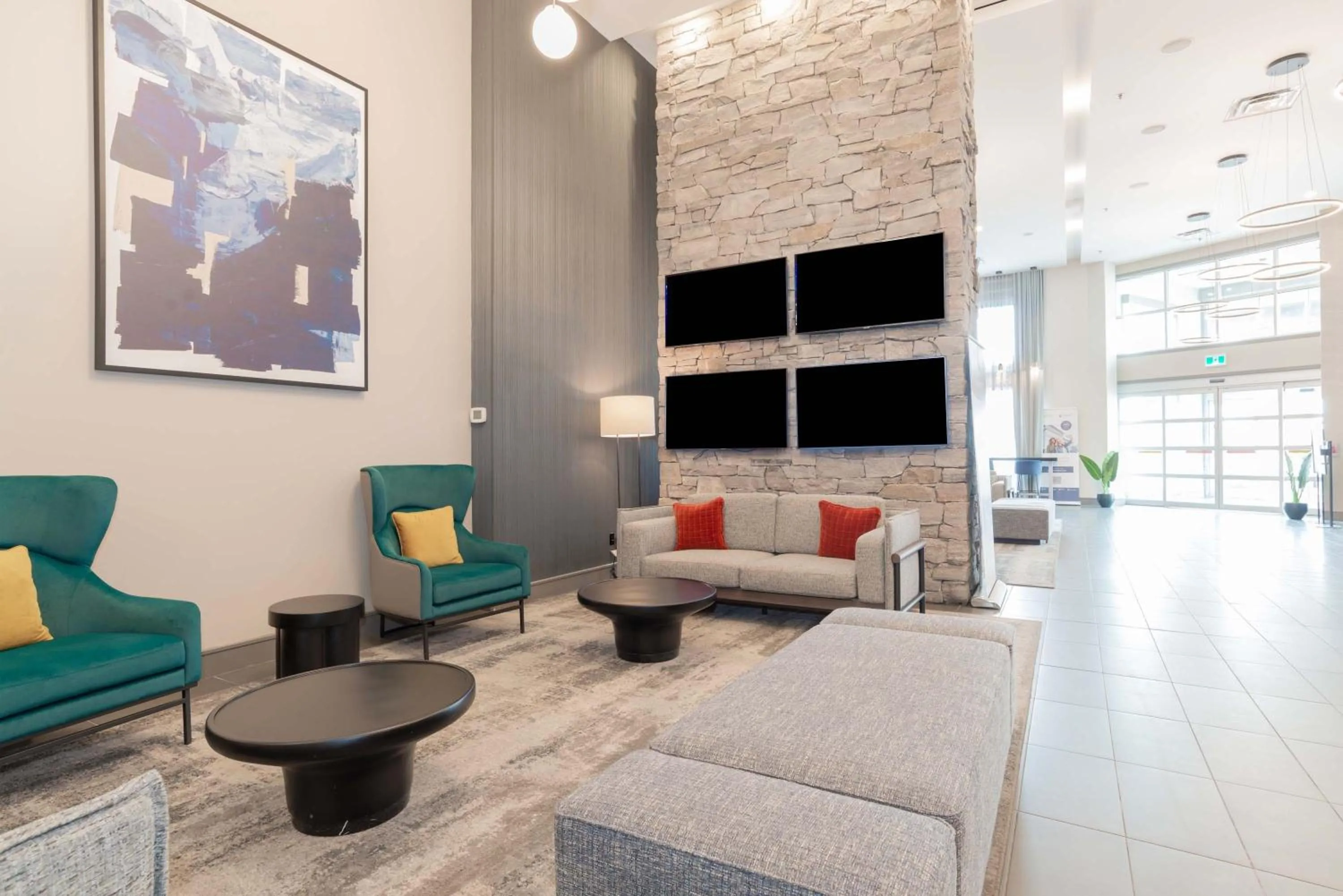 Lobby or reception in Sandman Signature Toronto Airport Hotel