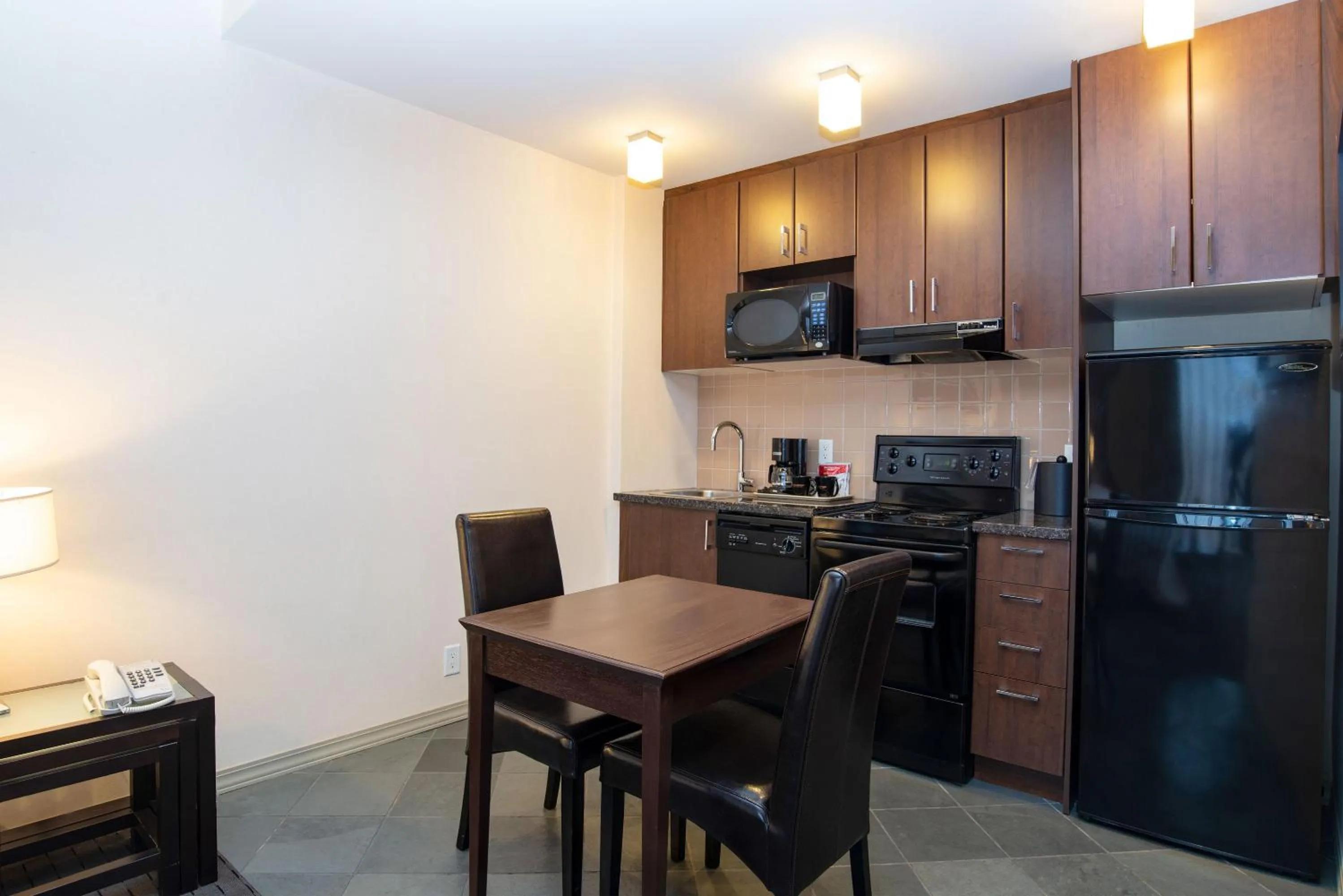 Kitchen or kitchenette in Sandman Suites Vancouver on Davie